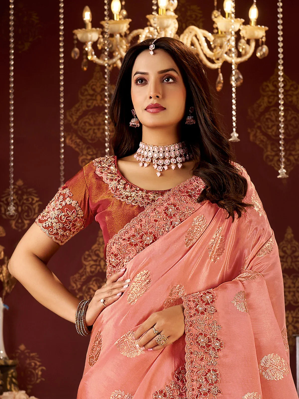 Tarani peach silk saree detailed upper-body-view showcasing zari embroidery