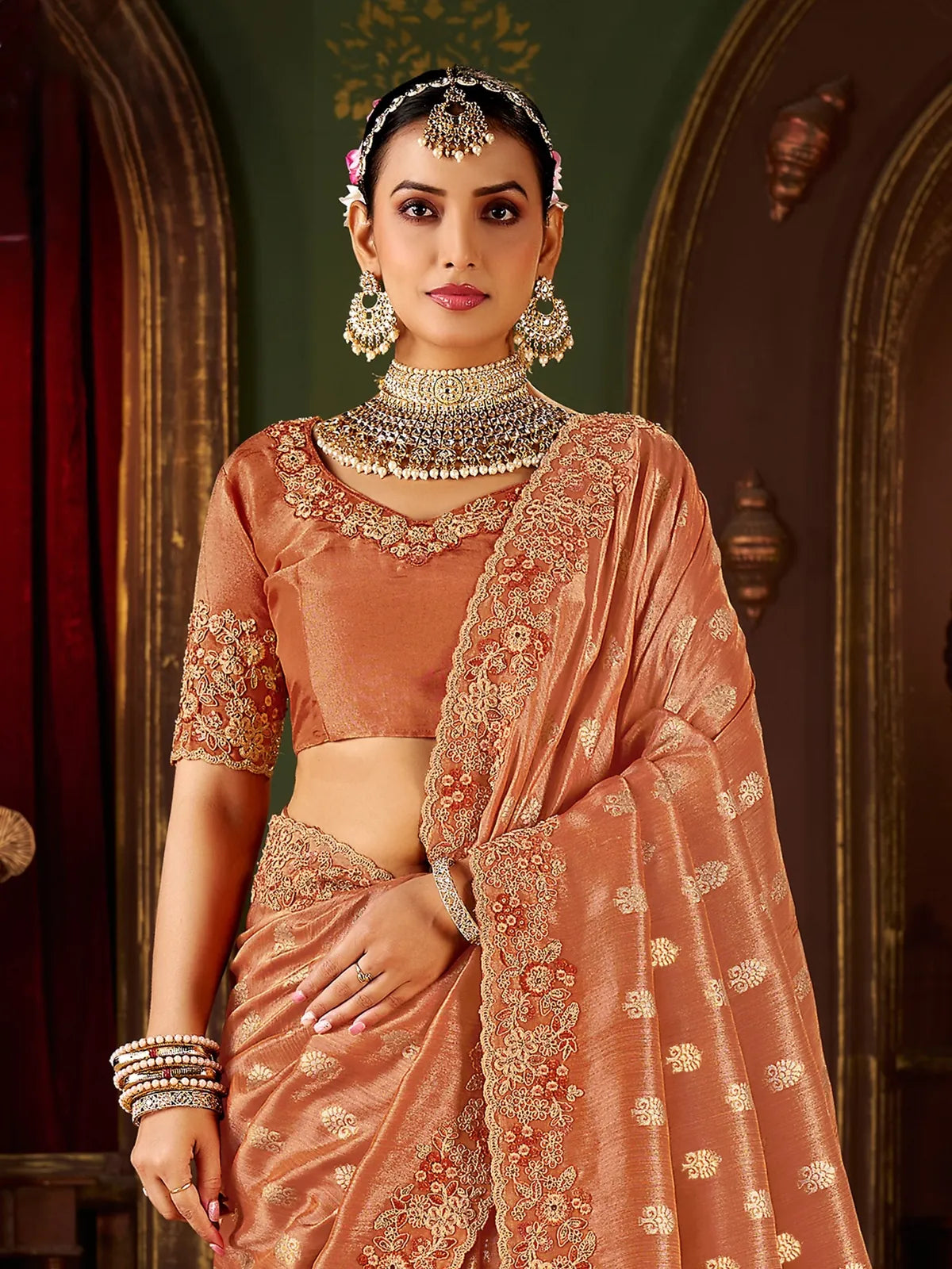 Tarani peach silk saree, upper body view with embroidered blouse and jewellery styling