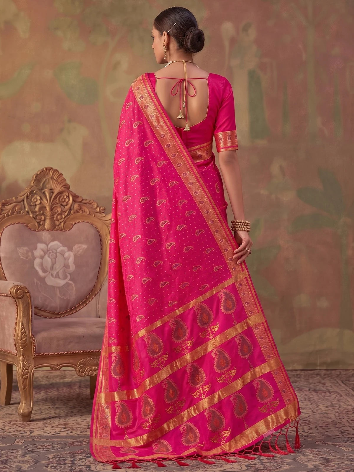 Tarani pink silk zari weaving saree back view highlighting rich pallu and zari design