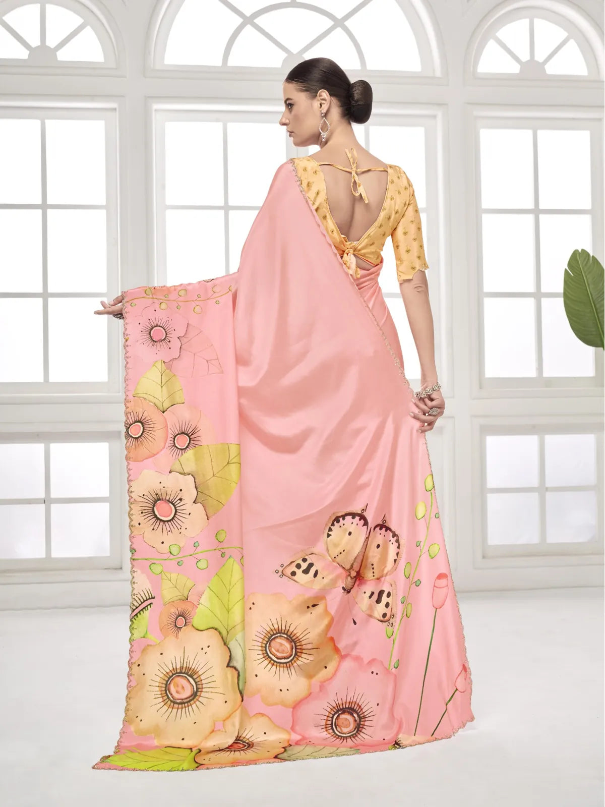 Tarani pink party saree with yellow deep-back work blouse back view