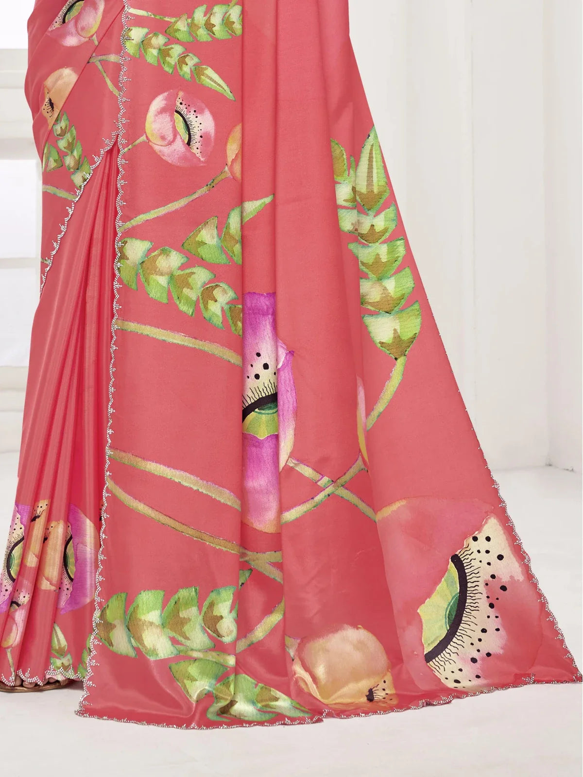 Tarani close-up of pink silk saree border with Swarovski work and modern artistic pallu design