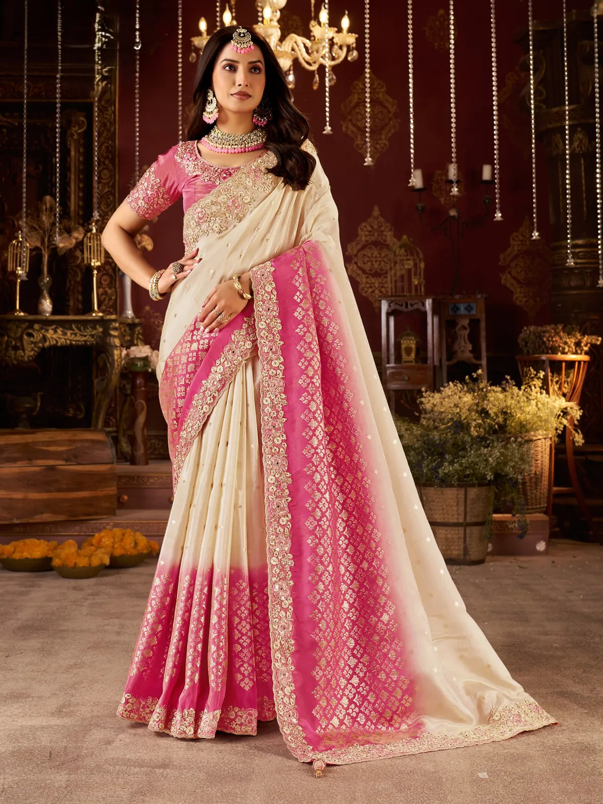 Tarani pink silk saree with cream body and embroidered zari border, styled for wedding and festive wear