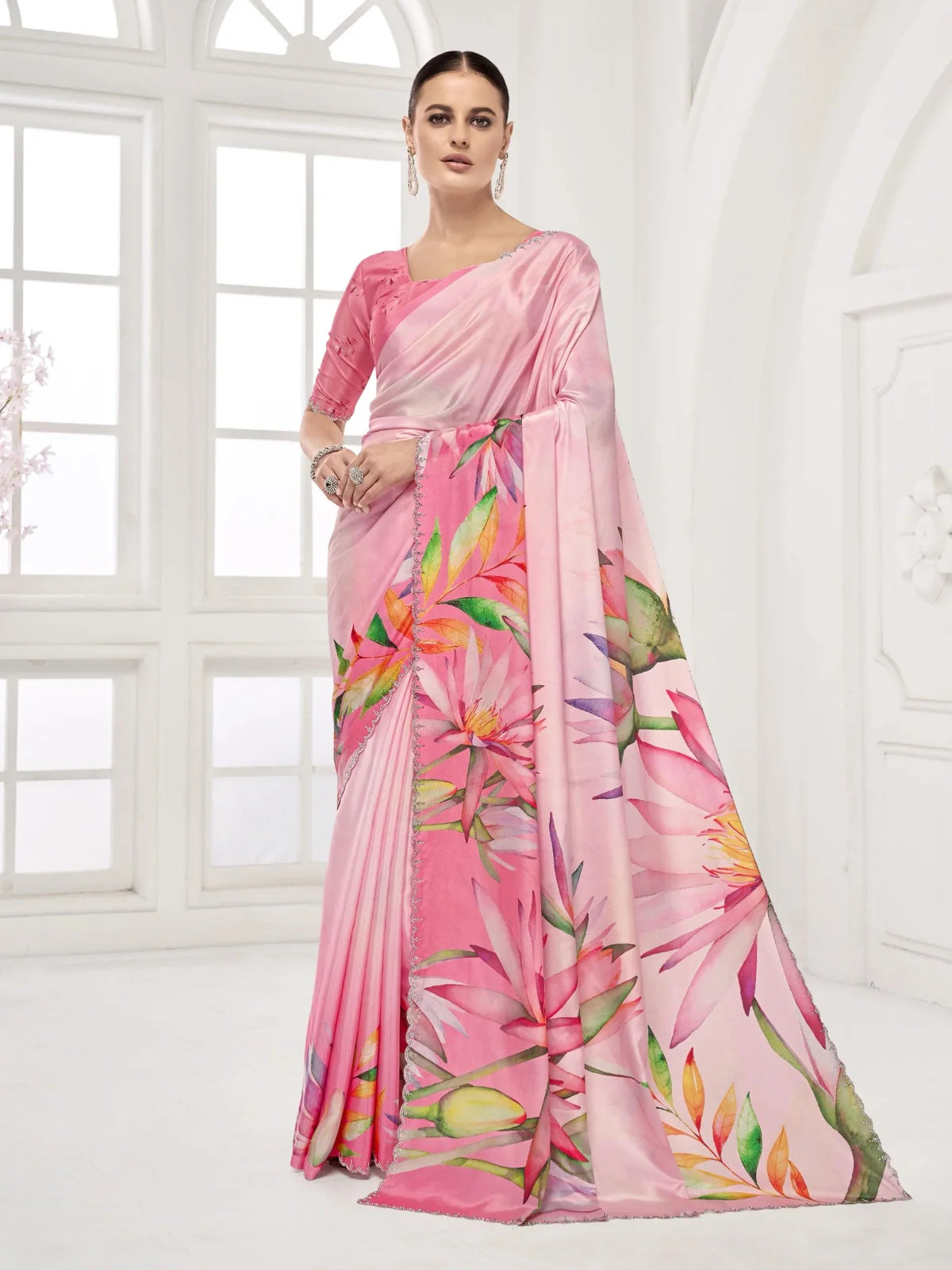 Tarani pink silk saree with digital floral print and Swarovski crystal border for party wear