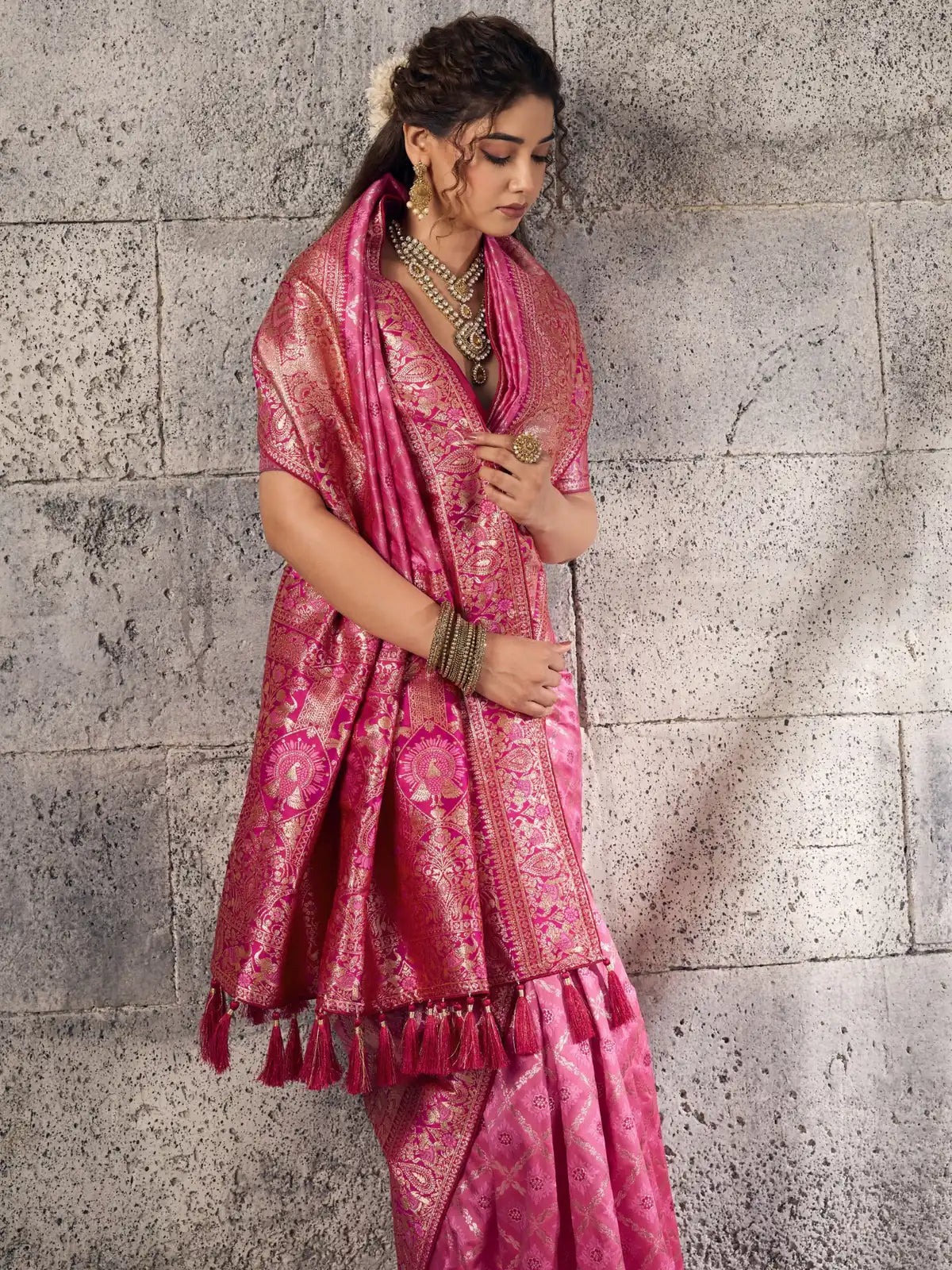 Tarani pink Banarasi silk saree pallu-view showcasing zari border and pallu