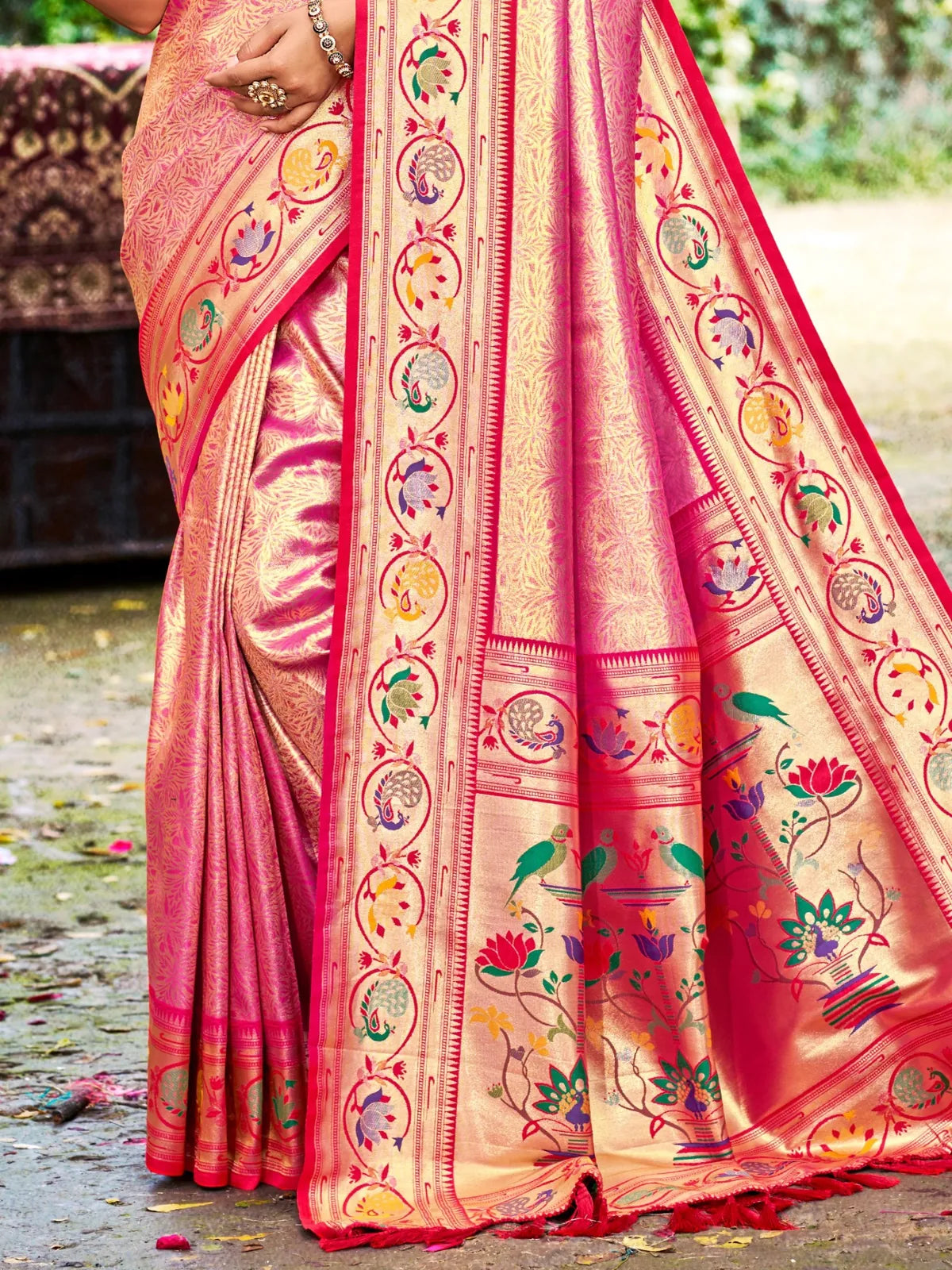 Tarani pink Kanjivaram silk saree pallu view with traditional woven floral motifs