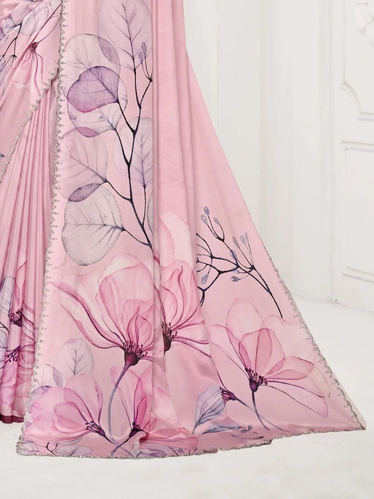 Tarani pink floral pallu saree closeup with Swarovski embellished border and leaf motifs