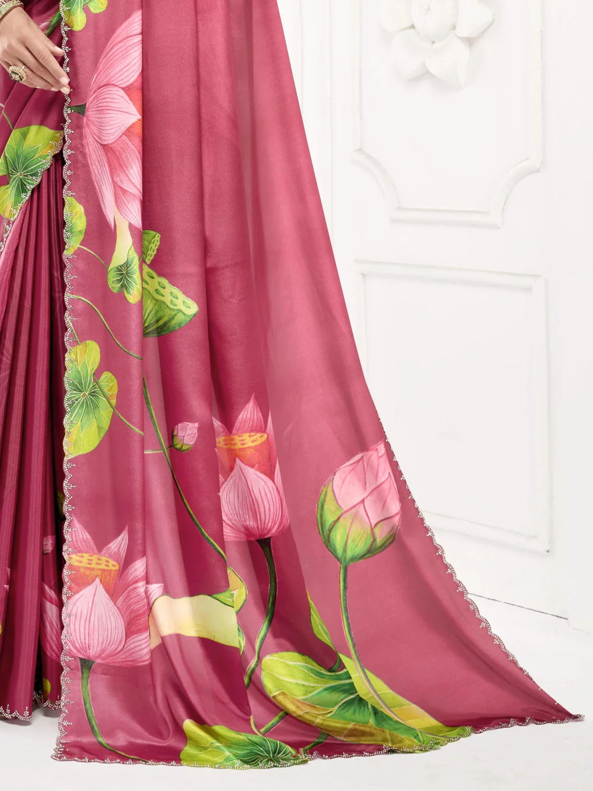 Tarani pink saree pallu view showing floral digital print and embellished border