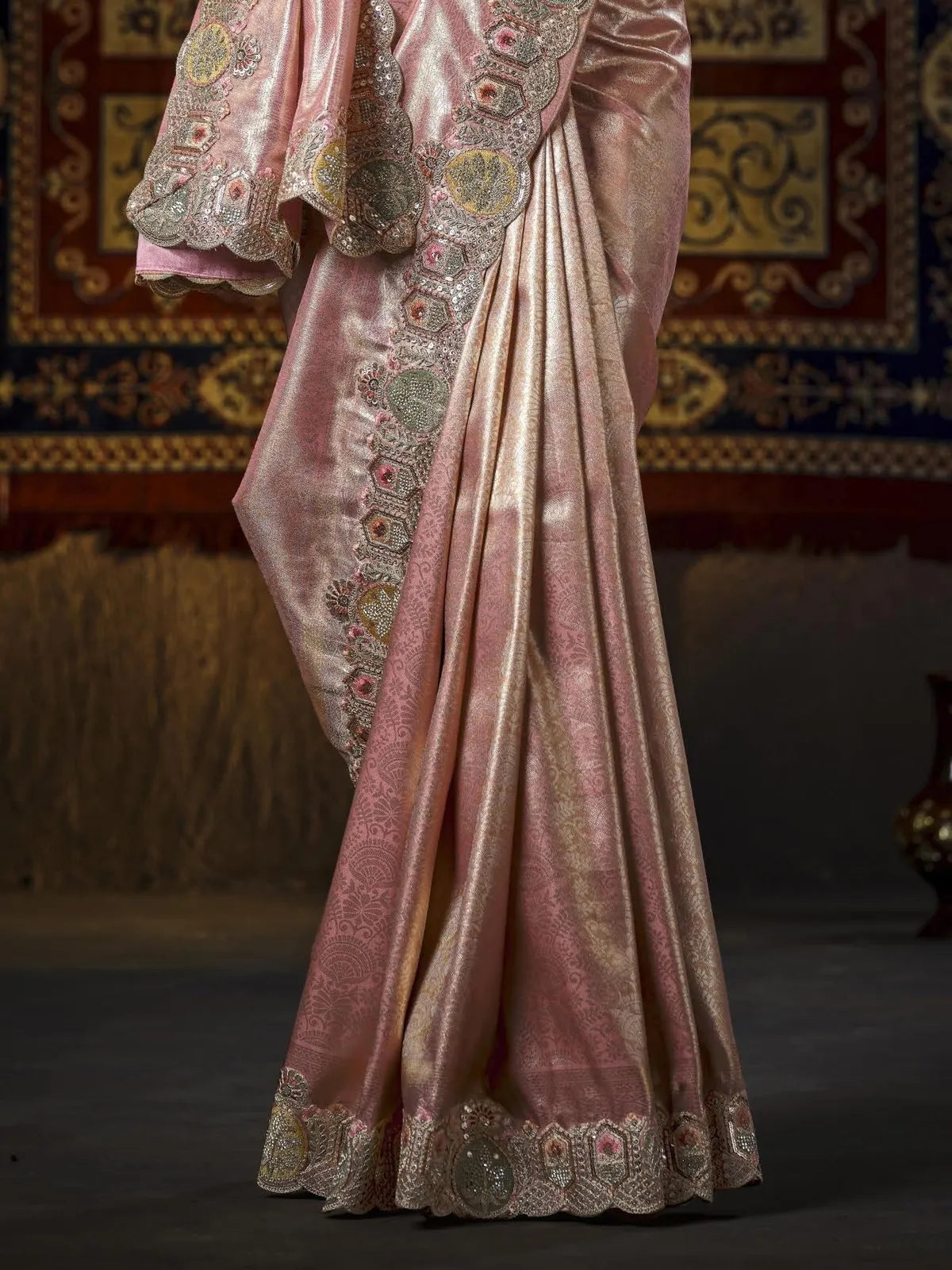 Tarani pink silk saree pallu view with heavy border embroidery