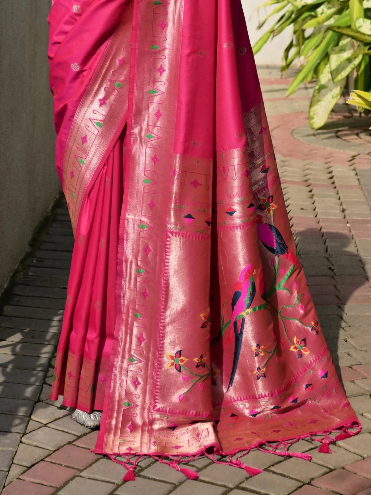 Tarani pink silk paithani saree close-up of zari meena pallu with parrot motifs and floral design