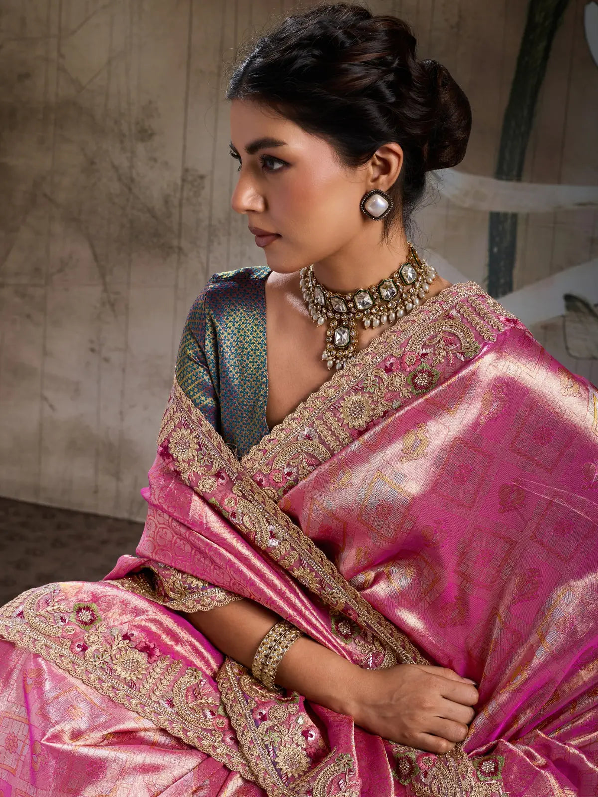 Tarani pink Banarasi jacquard silk saree with embroidered border and brocade blouse side-view