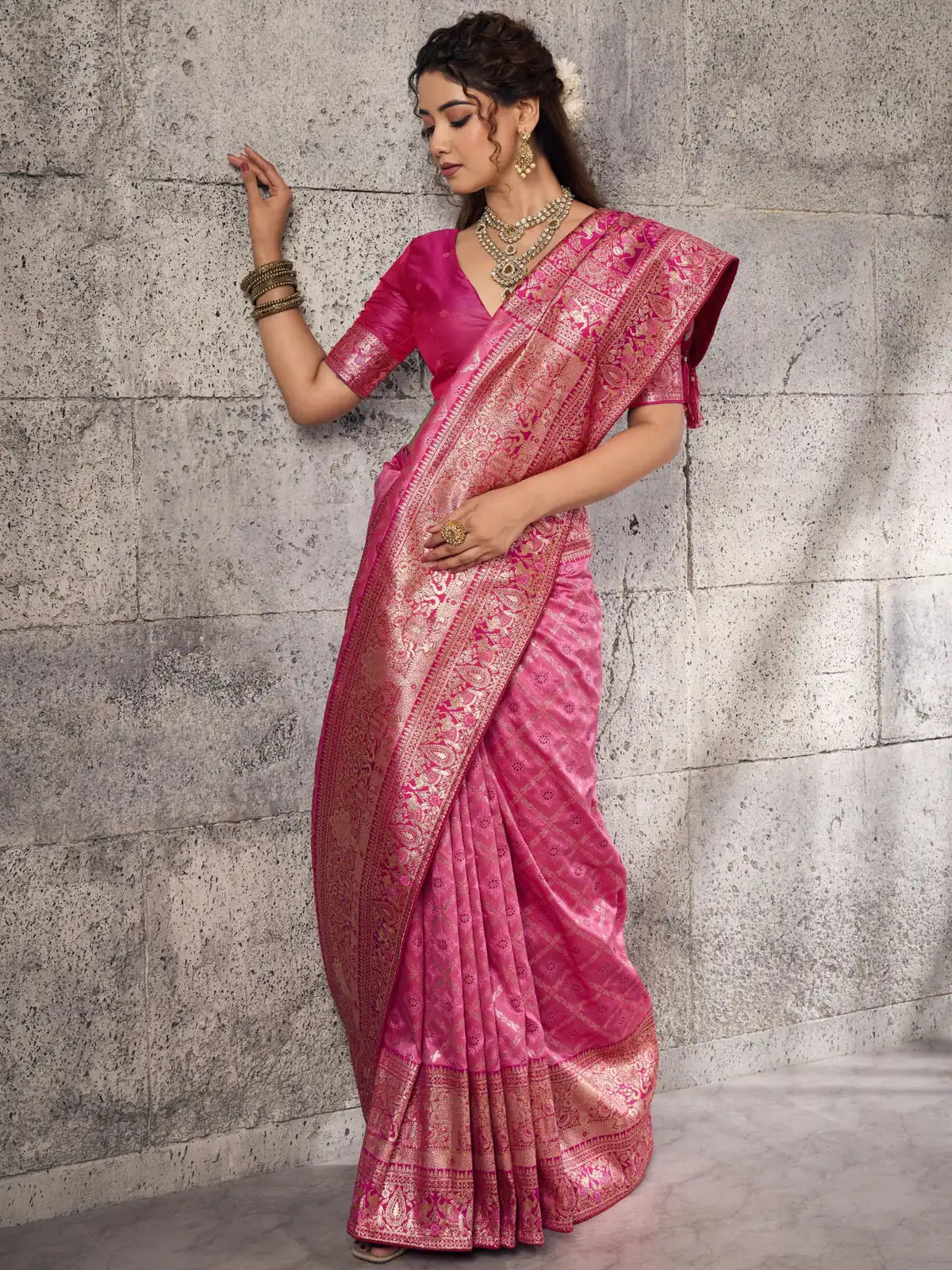 Tarani pink Banarasi silk saree side-view showcasing zari border and pallu