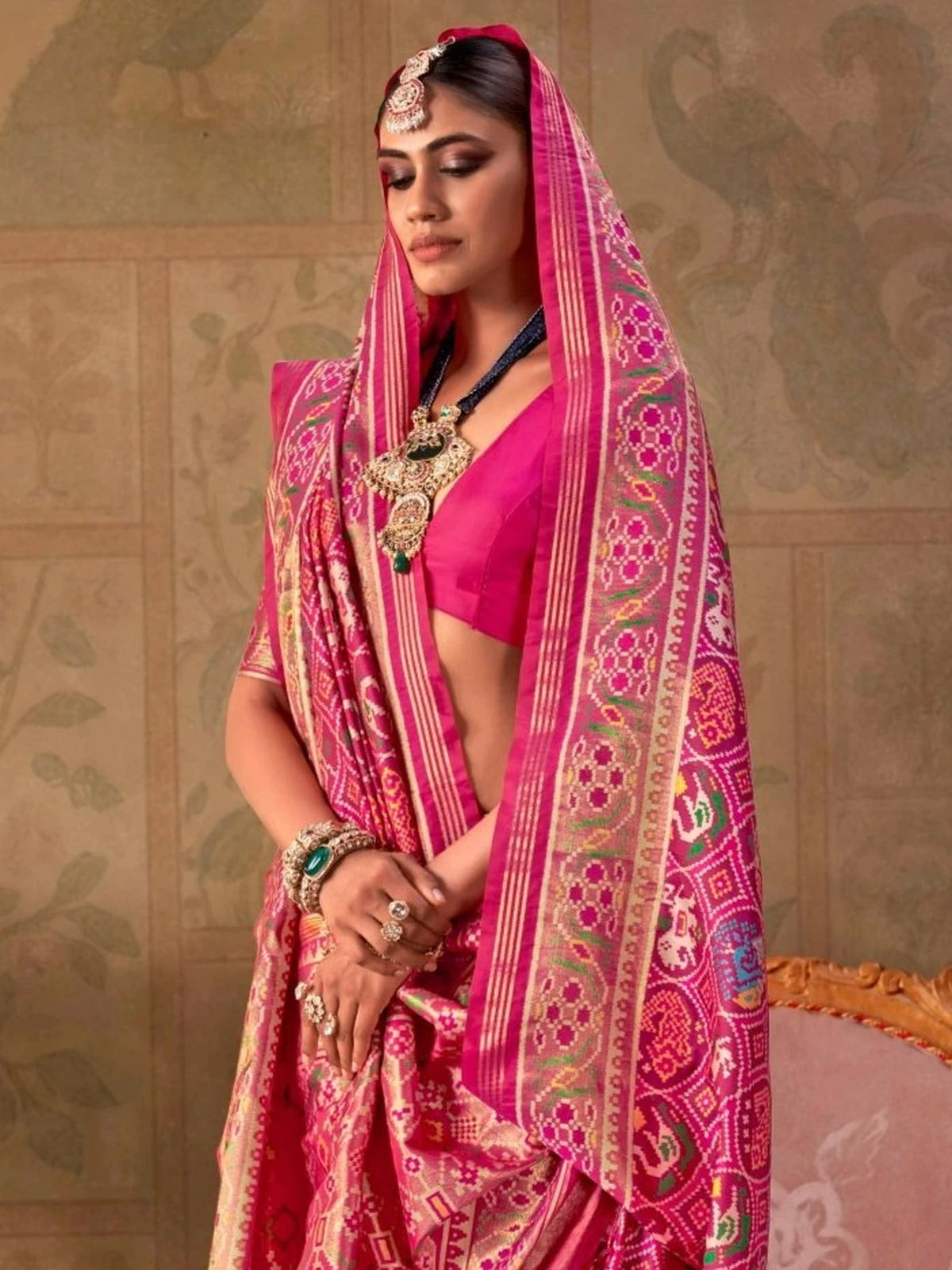 Tarani pink silk Patola saree upper body view with fine jari work