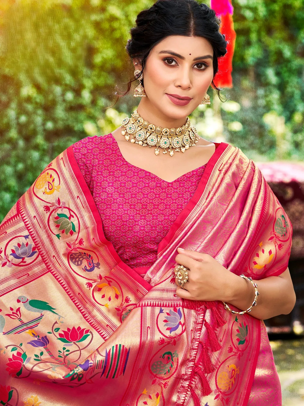 Tarani pink Kanjivaram silk saree upper body view showing woven blouse and border
