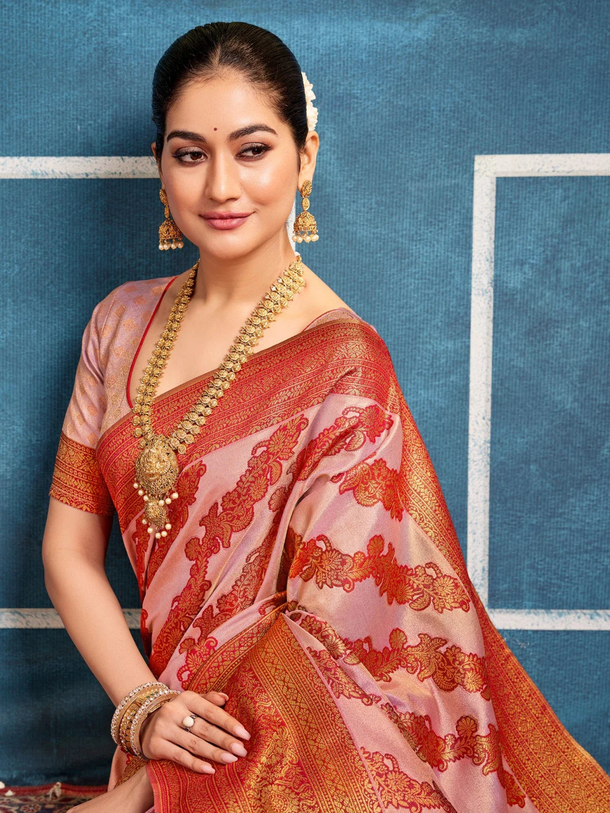 Tarani pink silk saree upper body pose showing blouse and neckline styling