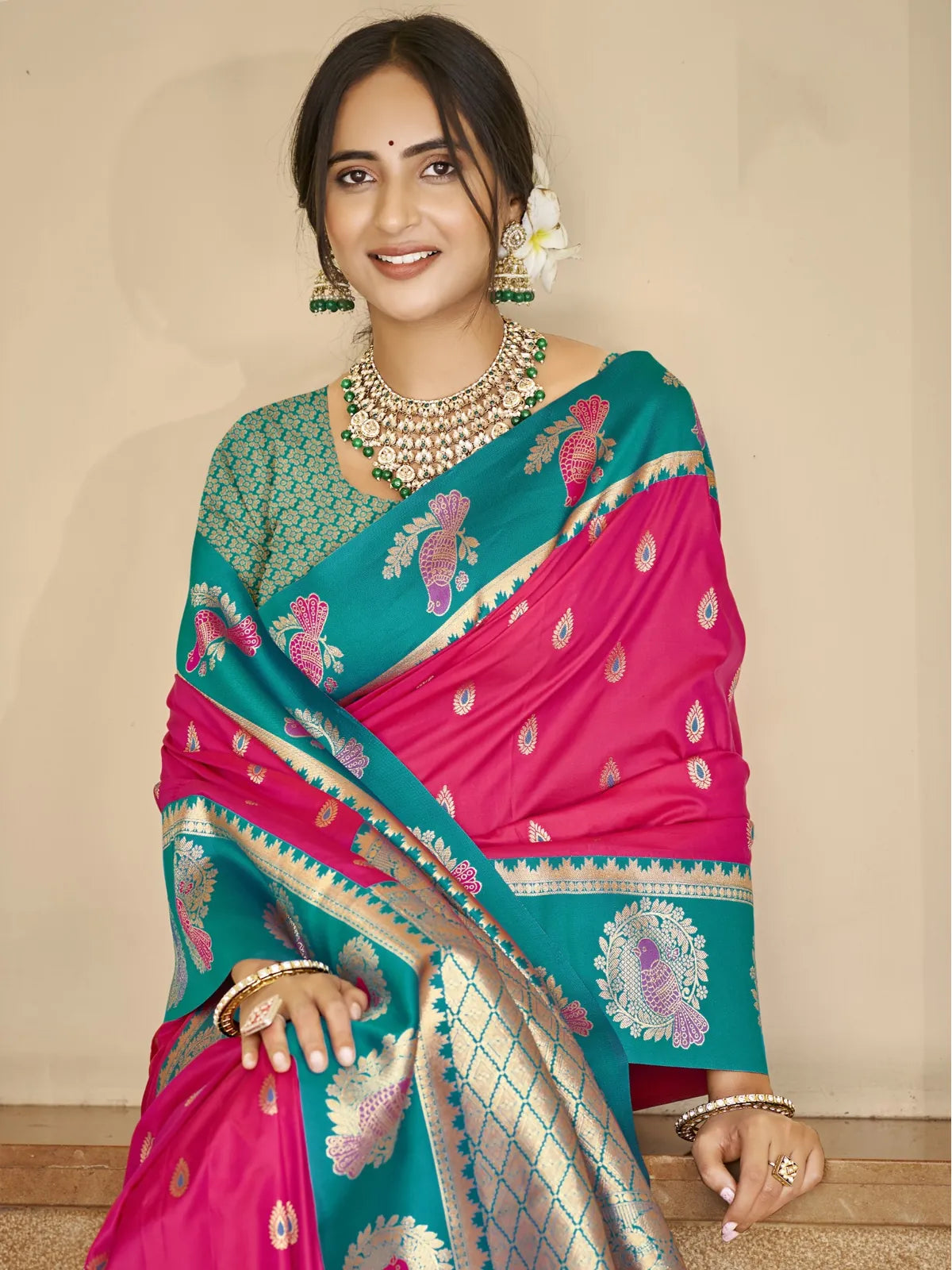 Tarani premium pink silk saree with intricate pallu and matching green blouse, upper body view