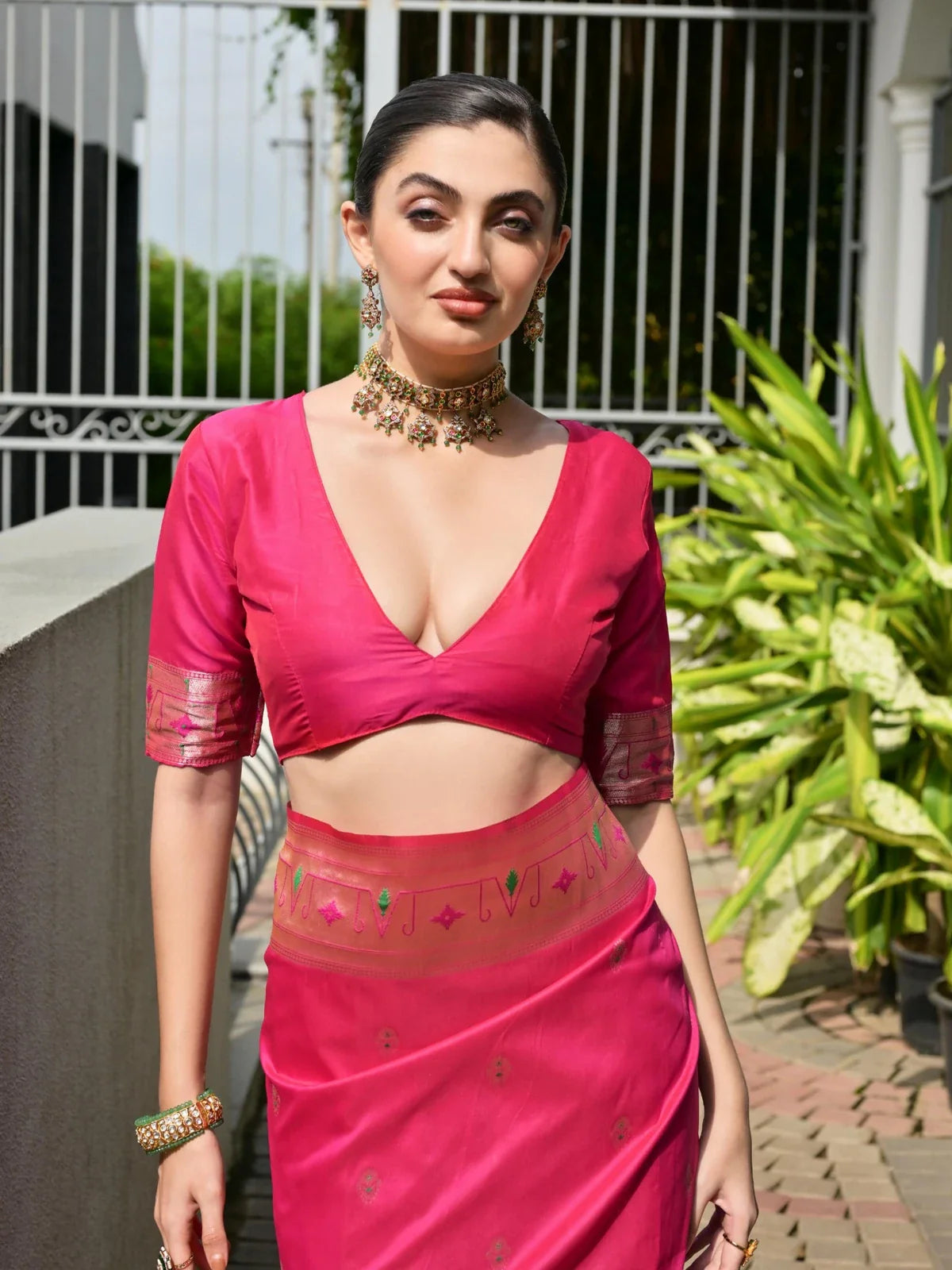 Tarani pink Banarasi silk saree upper-body view with designer blouse and elegant neckline