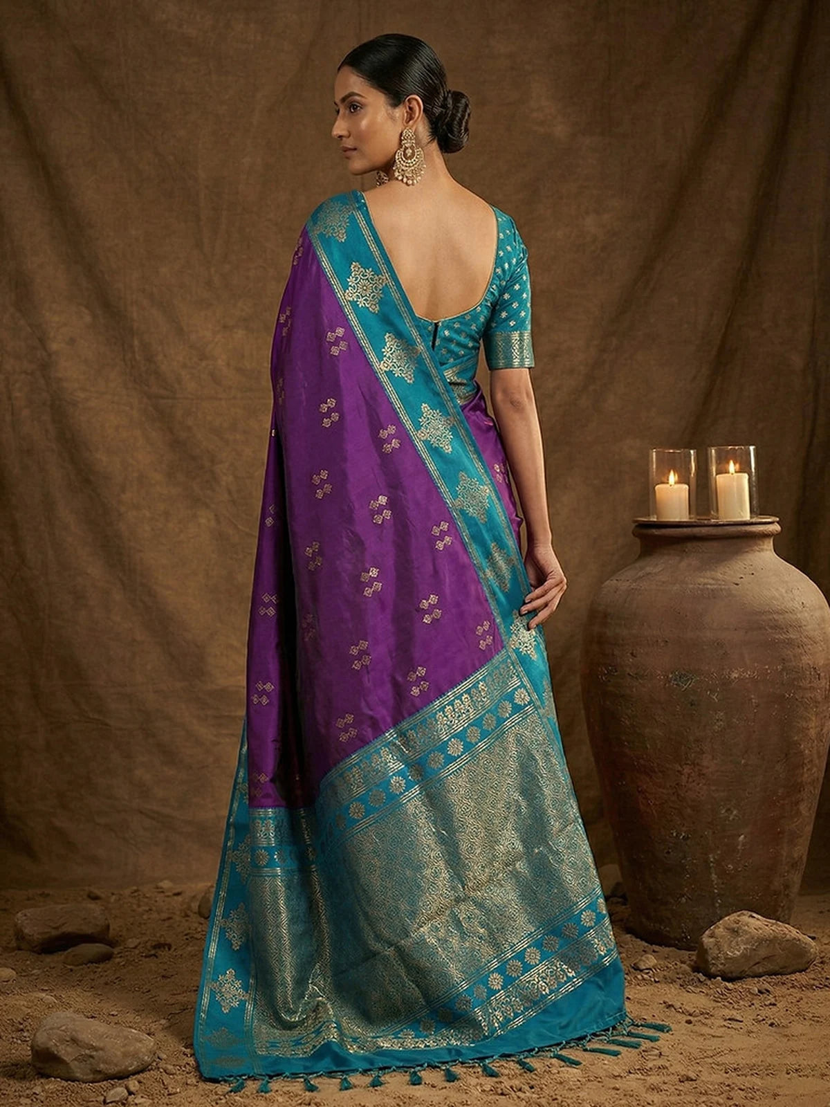 Tarani purple silk saree back view with teal zari pallu and elegant blouse design