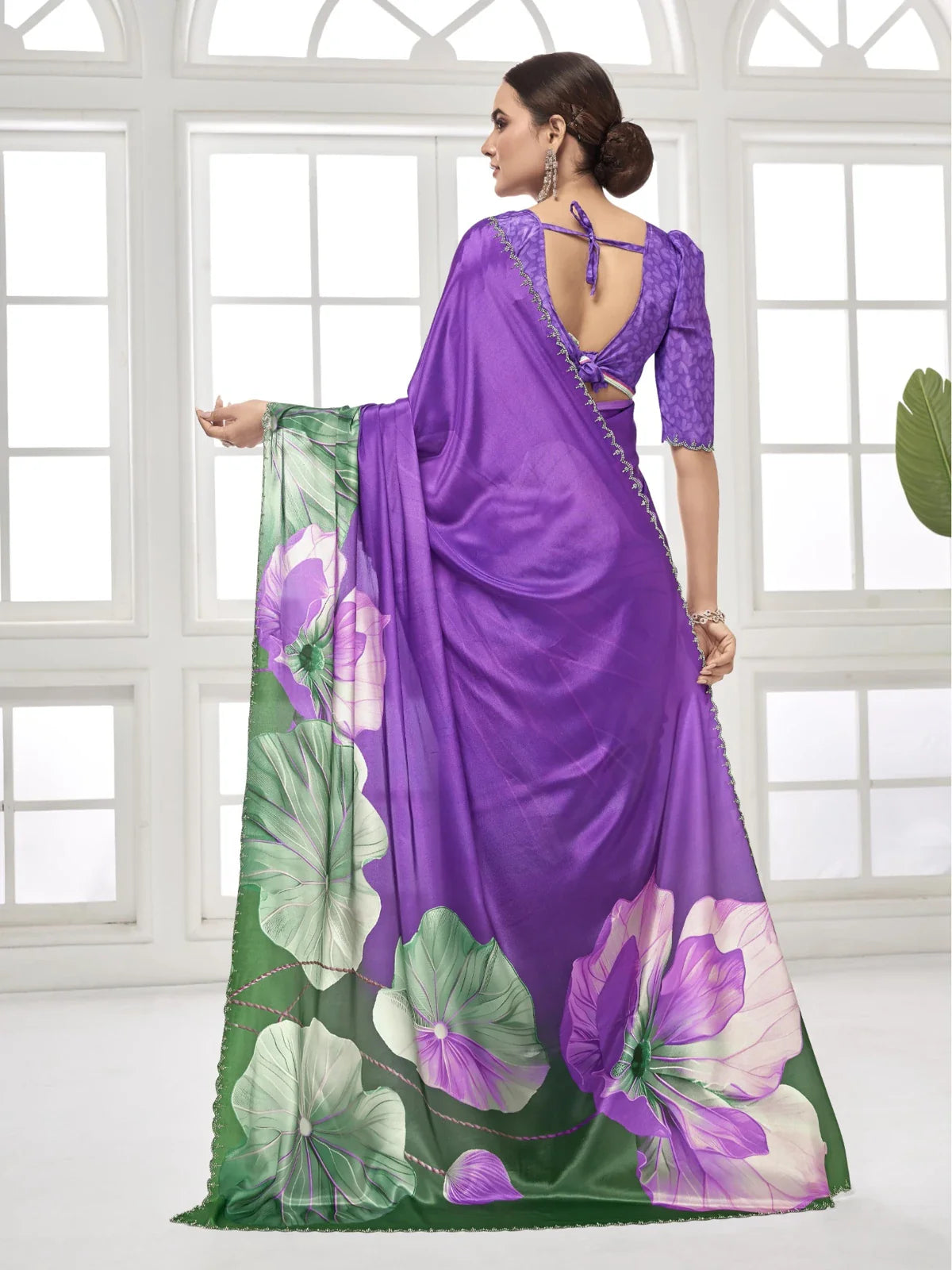 Tarani purple silk saree full back view showing blouse tie-back design and floral drape