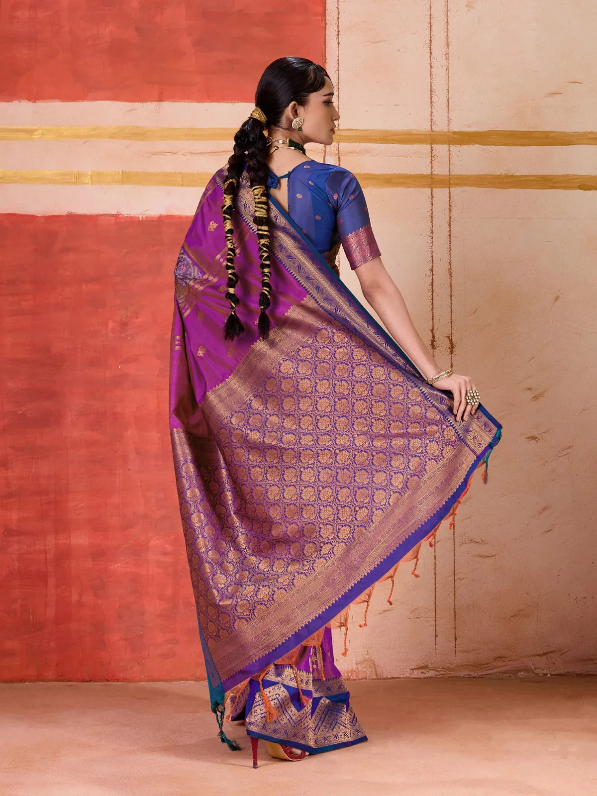 Tarani purple silk saree full back view with intricate pallu and tassel finish