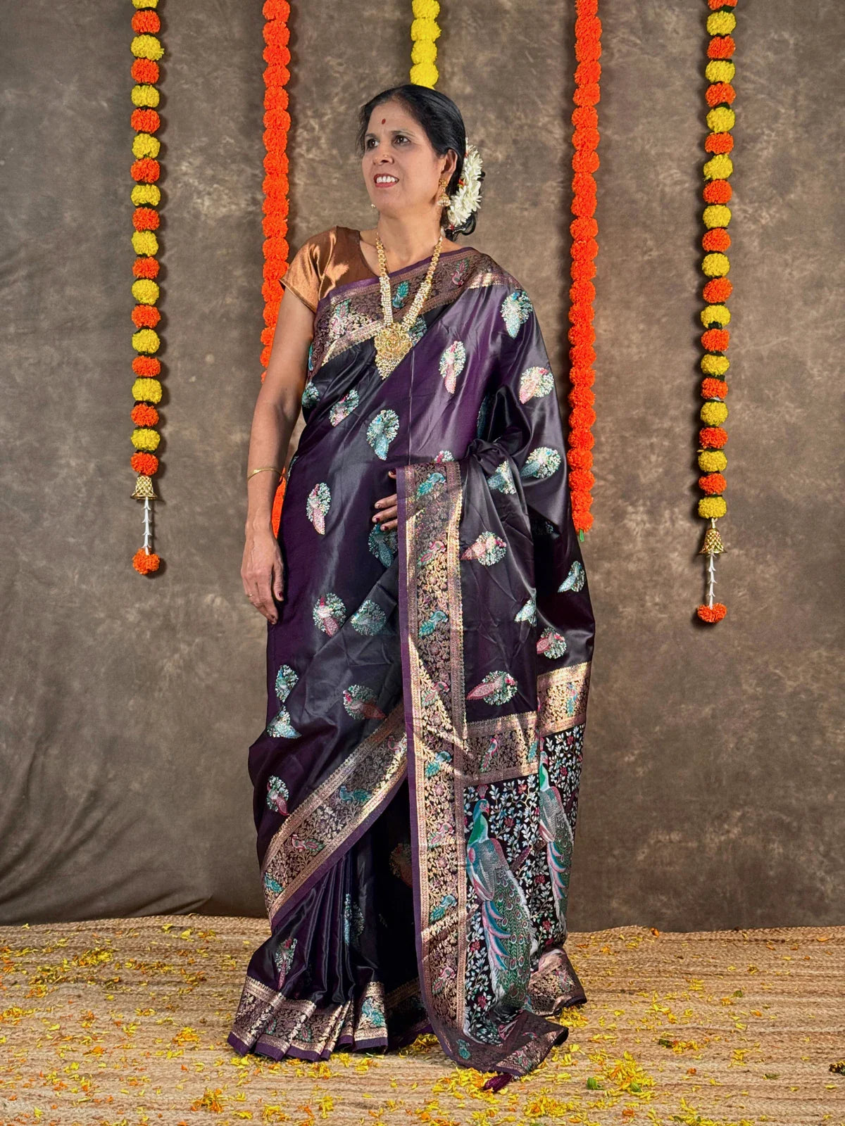 Tarani premium purple silk saree with peacock woven design and golden border for festive and party wear