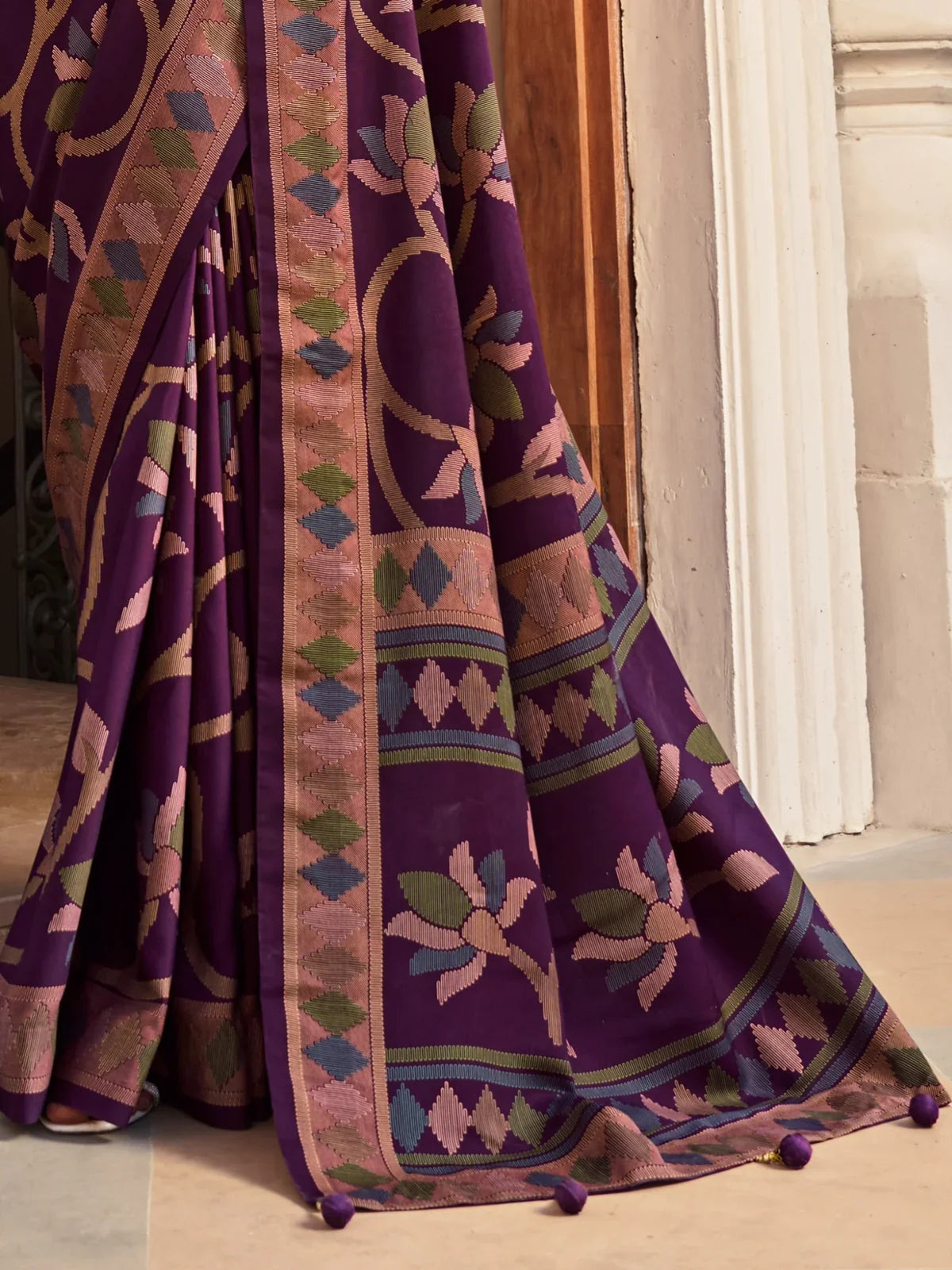 Tarani purple silk saree pallu closeup with floral and geometric motifs