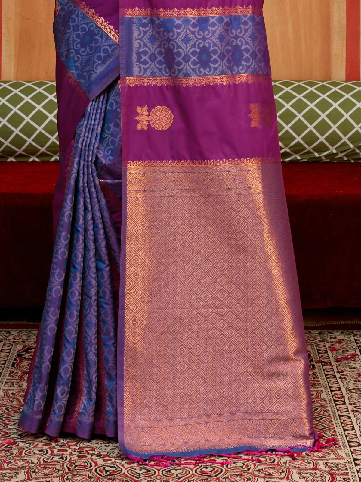 Tarani close look at the pallu and intricate golden zari weaving on purple silk saree