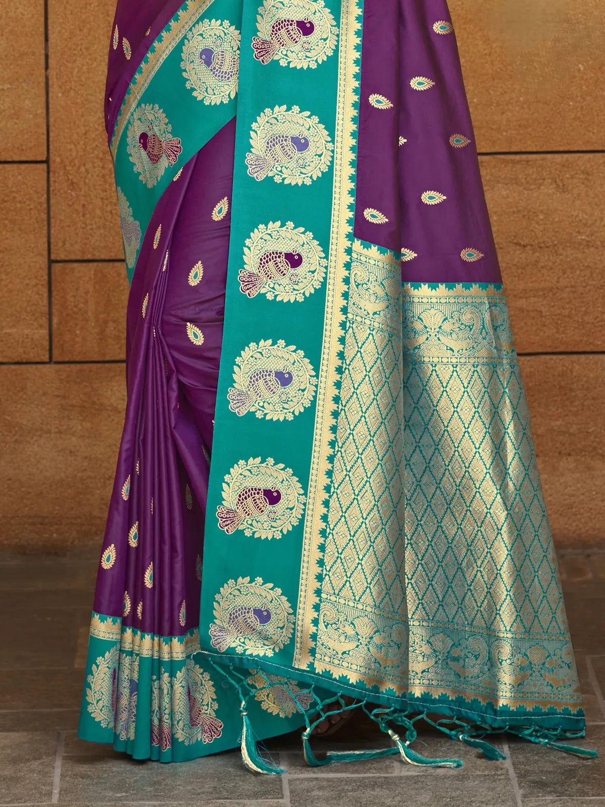 Tarani saree close view of zari pallu and border in peacock motif weaving on purple silk