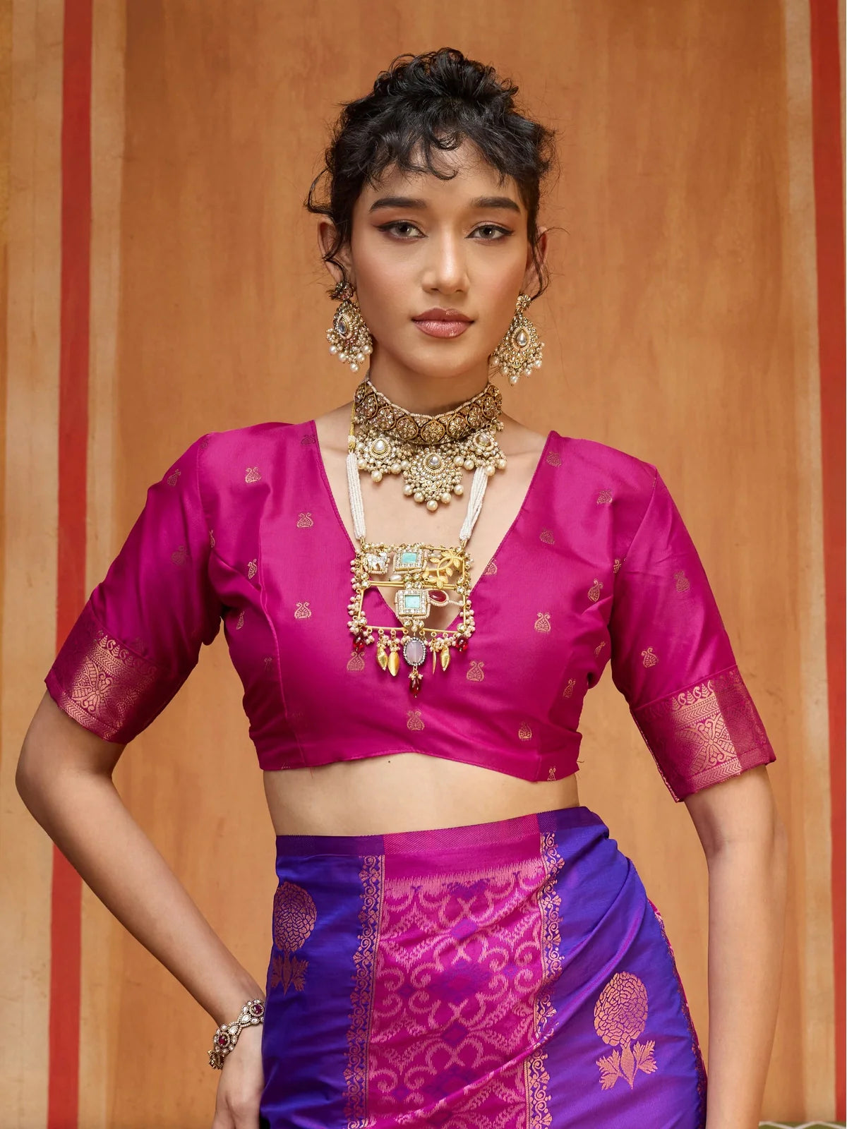 Tarani purple silk saree upper body closeup with rich pink pallu and zari work