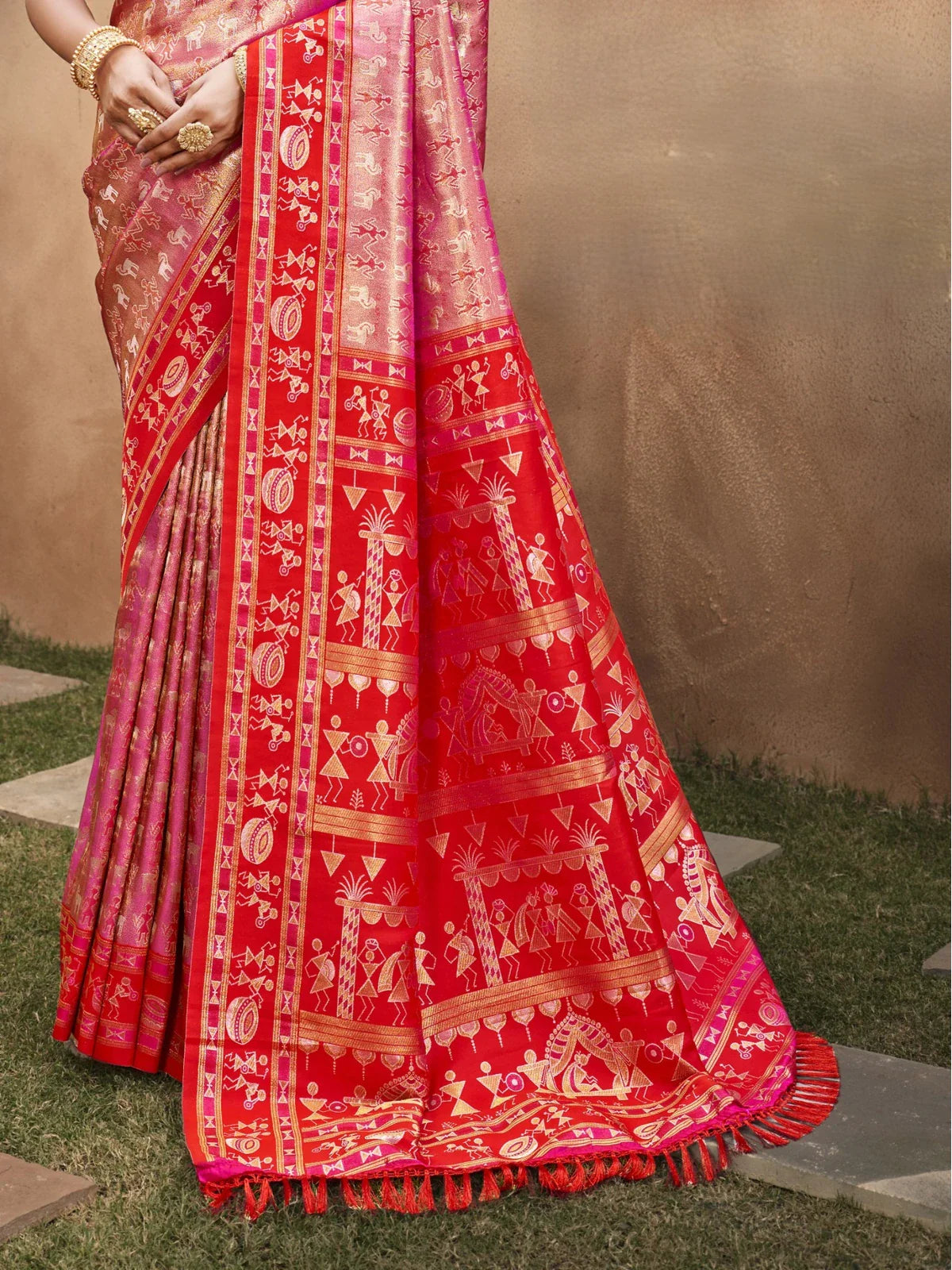 Tarani red kanjivaram silk saree pallu view highlighting intricate golden weaving