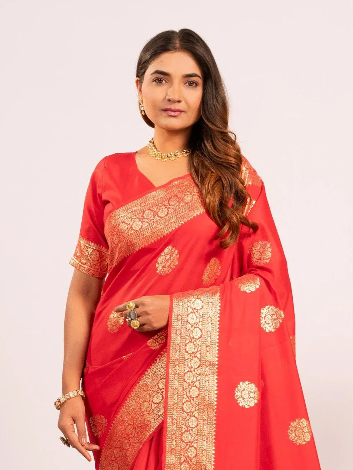 Tarani red soft banarasi saree upper body view showing golden border and blouse styling