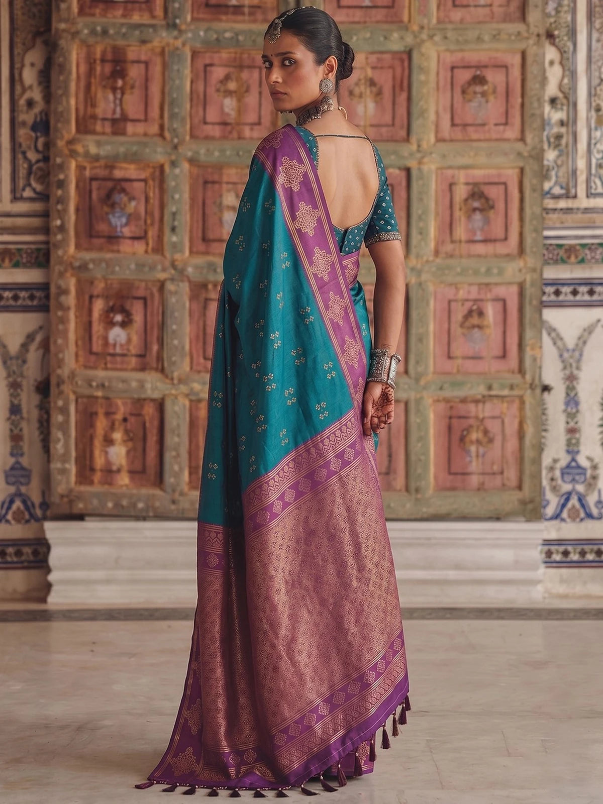 Tarani premium soft silk teal saree with purple woven border back view Smruti
