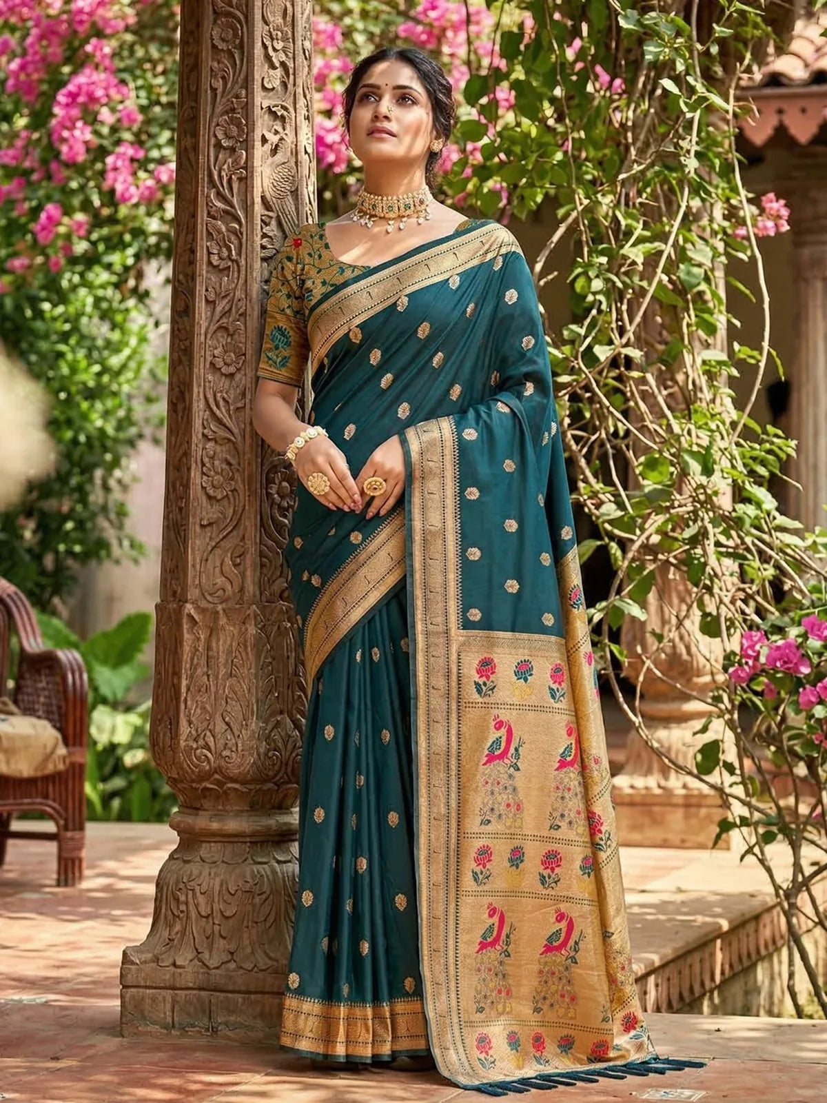 Tarani teal soft silk saree front pose highlighting contrast border and pallu