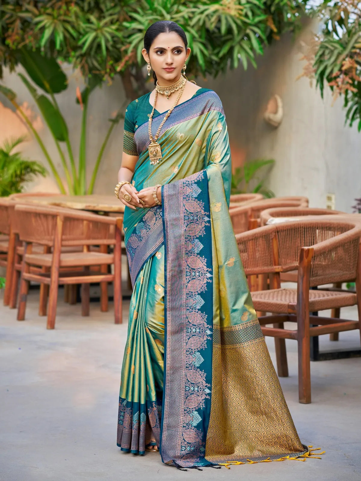 Tarani teal soft silk saree with zari woven border full view for festive and wedding wear