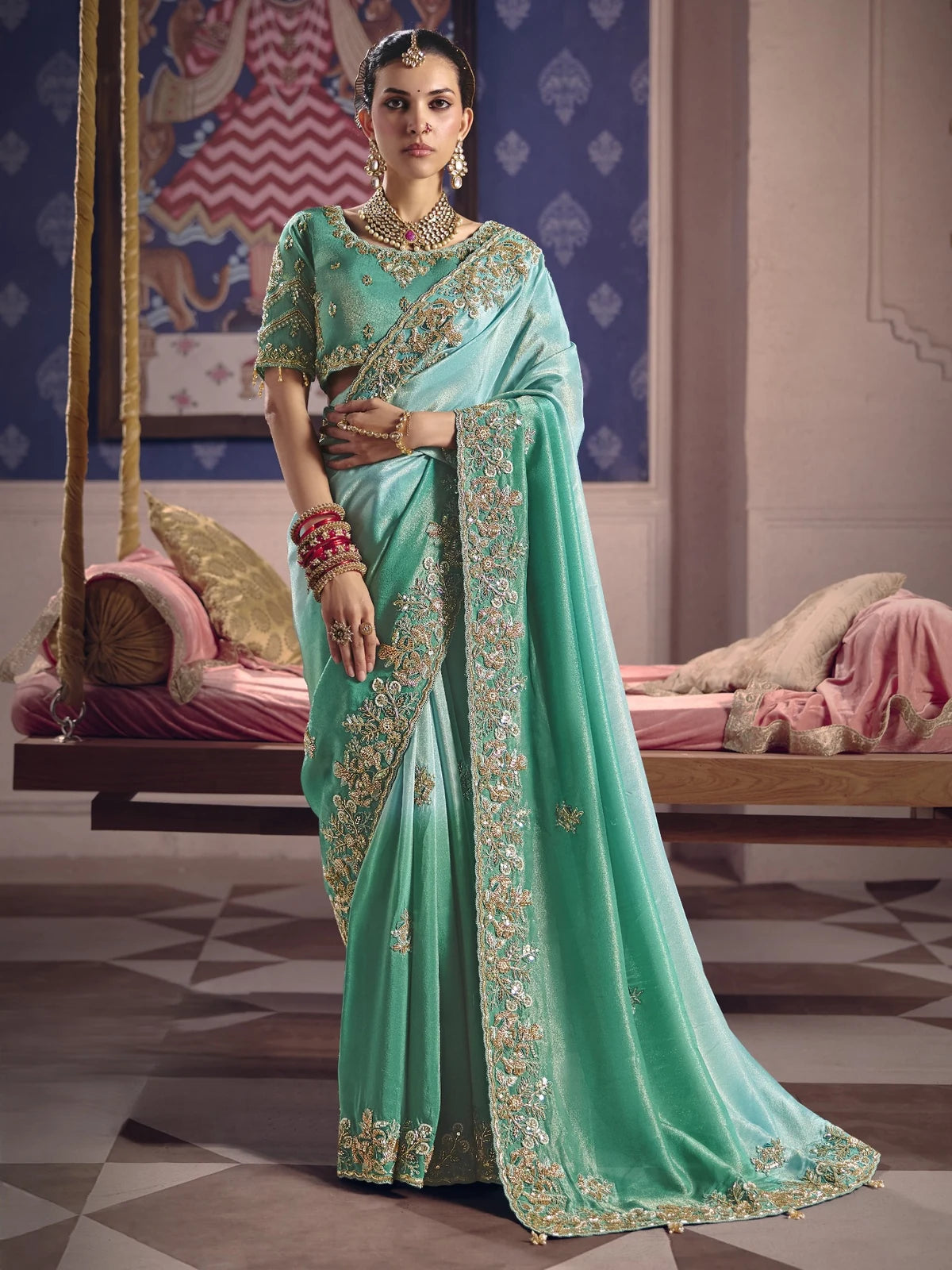 Tarani Adhira teal Viscose Zari Tissue Silk saree full view with heavy embroidery bead work and designer blouse