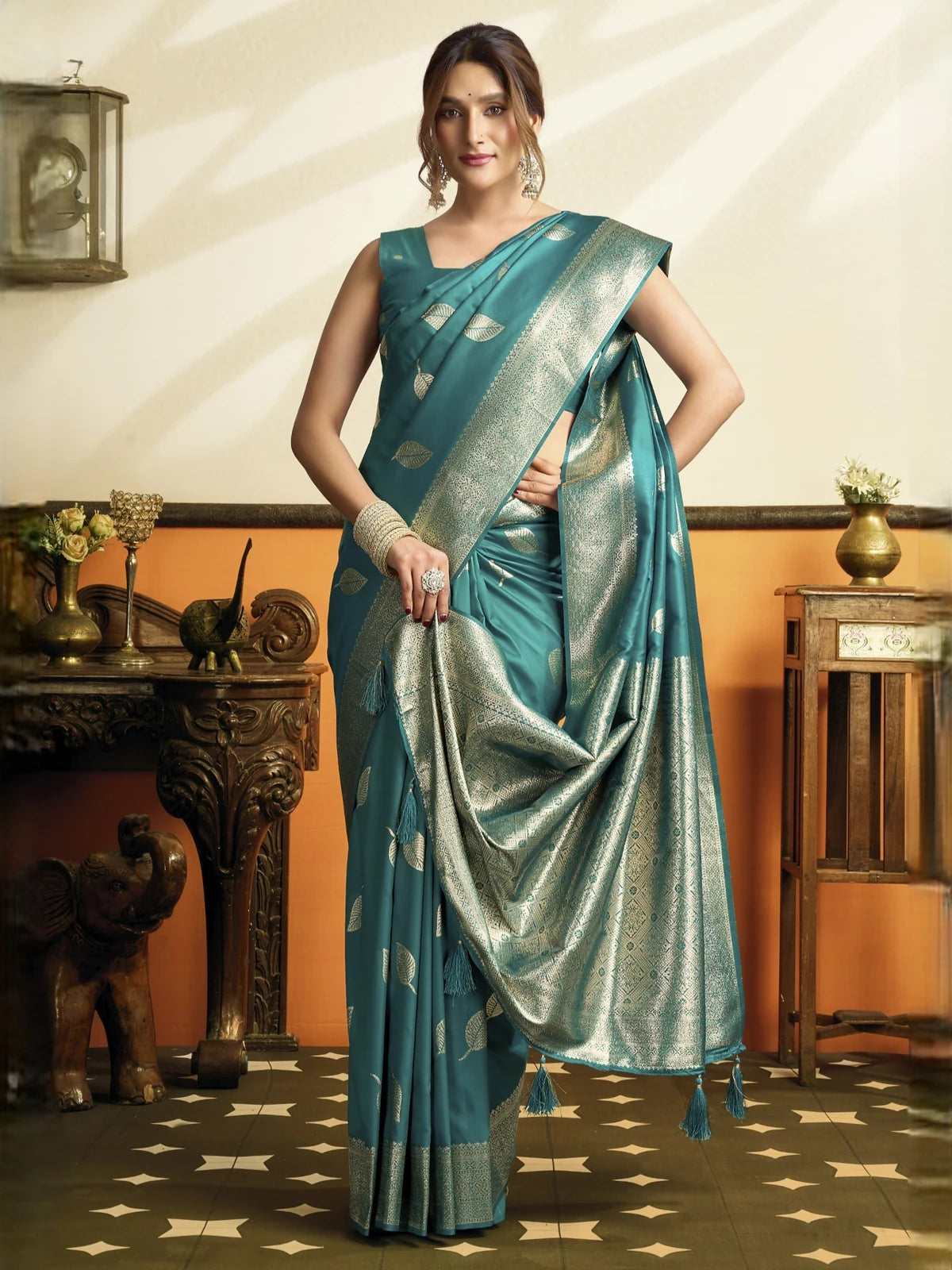Tarani Reshika teal soft silk saree pallu view with rich zari weaving, border and tassels