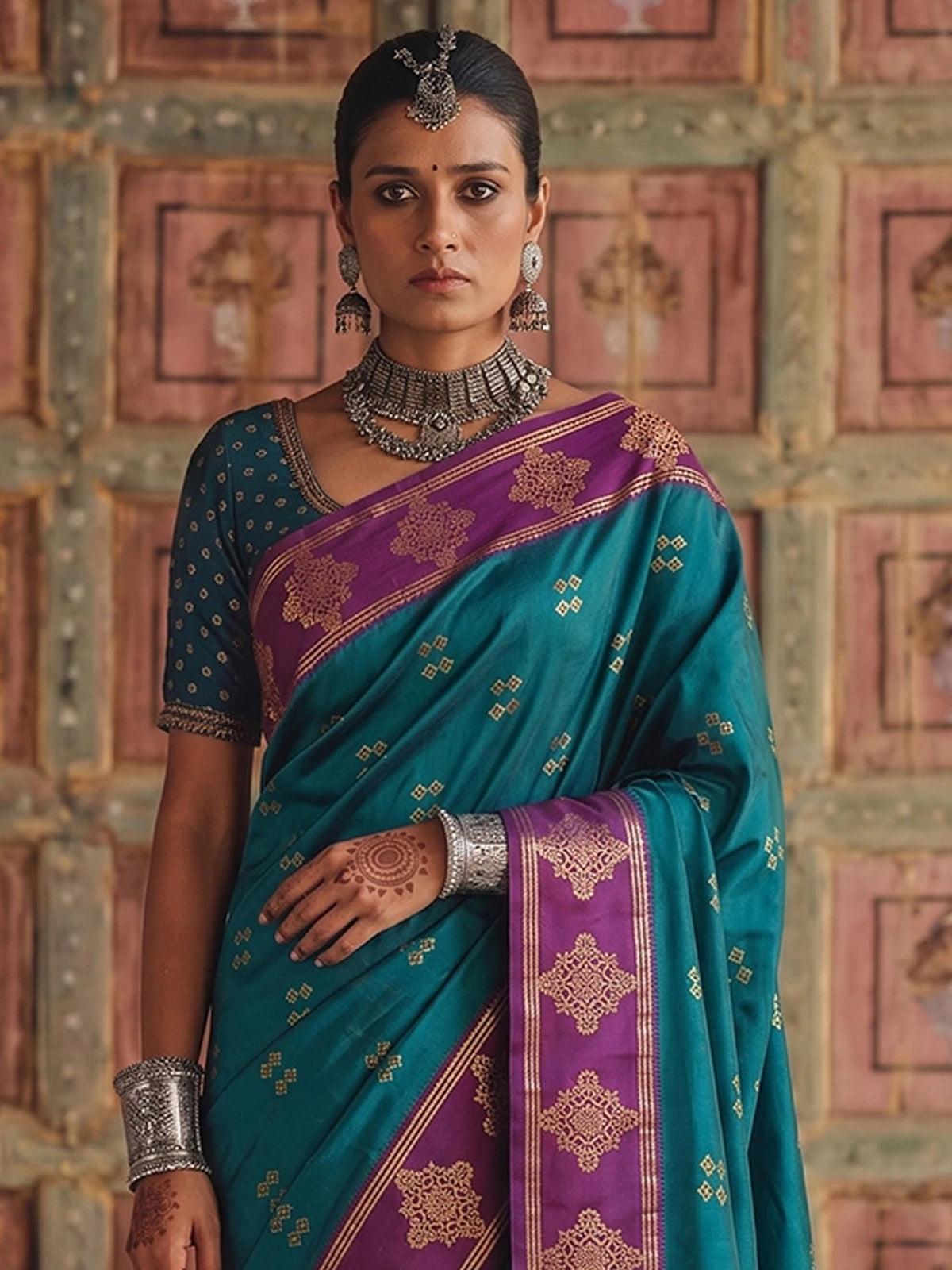 Tarani premium soft silk teal saree with purple woven border upper body view Smruti