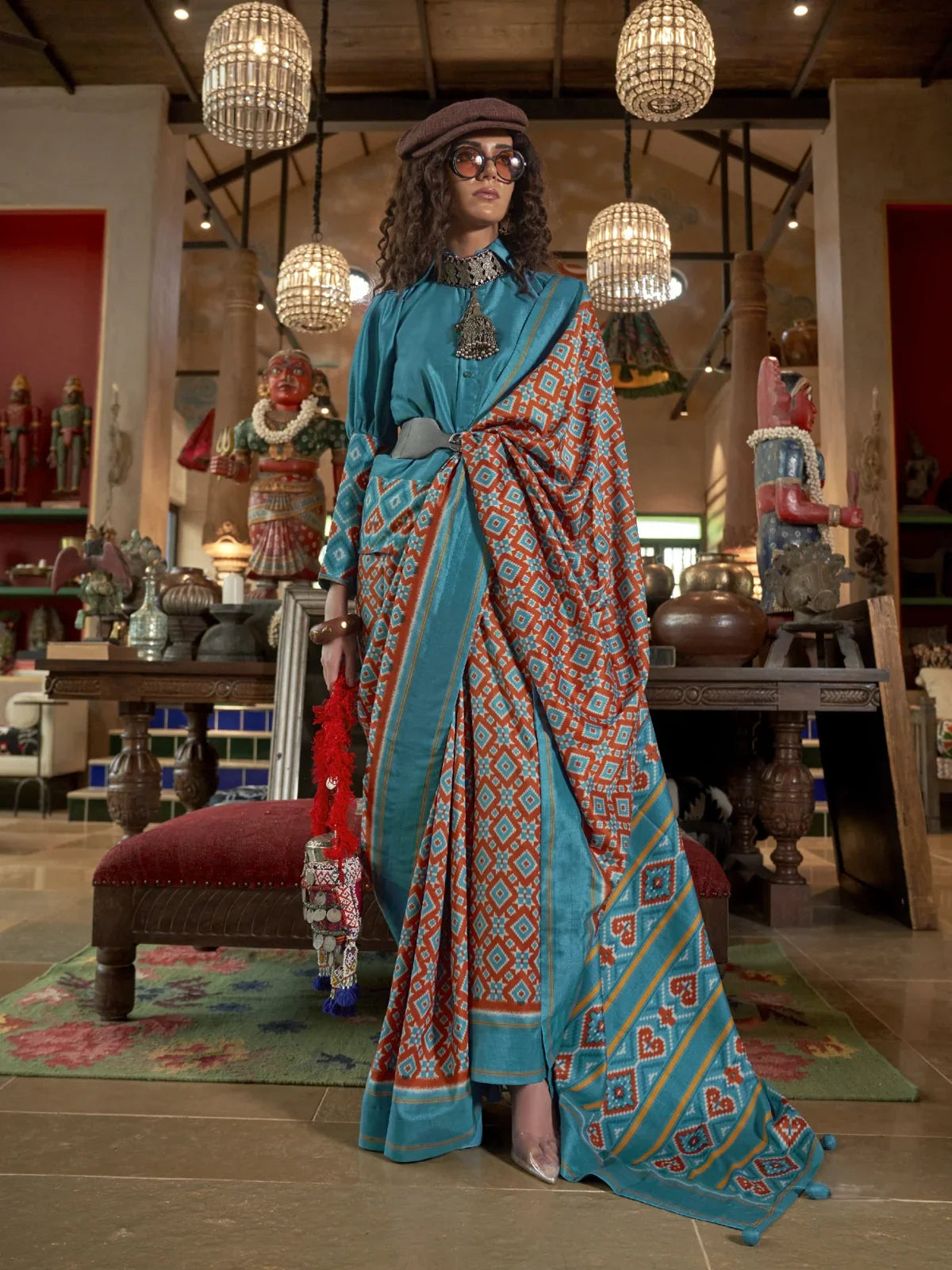 Tarani turquoise double ikkat party wear silk saree with signature print and matching blouse