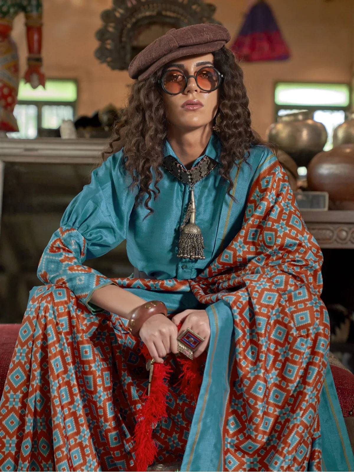 Tarani artistic turquoise silk saree with elegant upper body styling and necklace detail