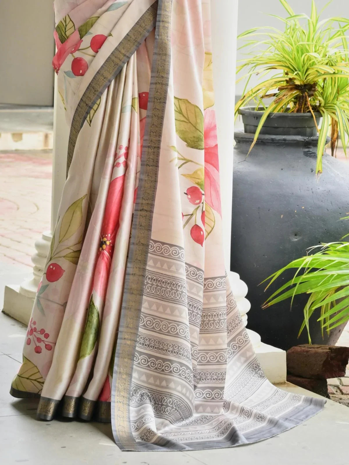 Tarani satin silk saree with printed pallu and hand-painted floral close-up