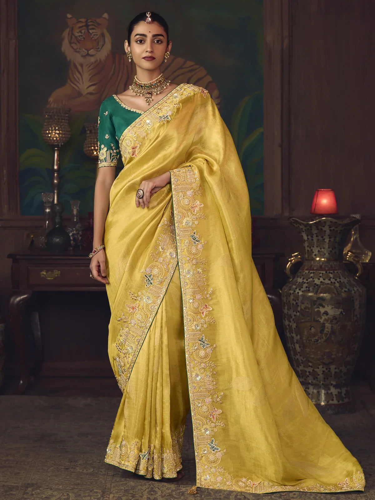 Tarani yellow silk saree with heavy embroidery and full front view for wedding and festive occasions