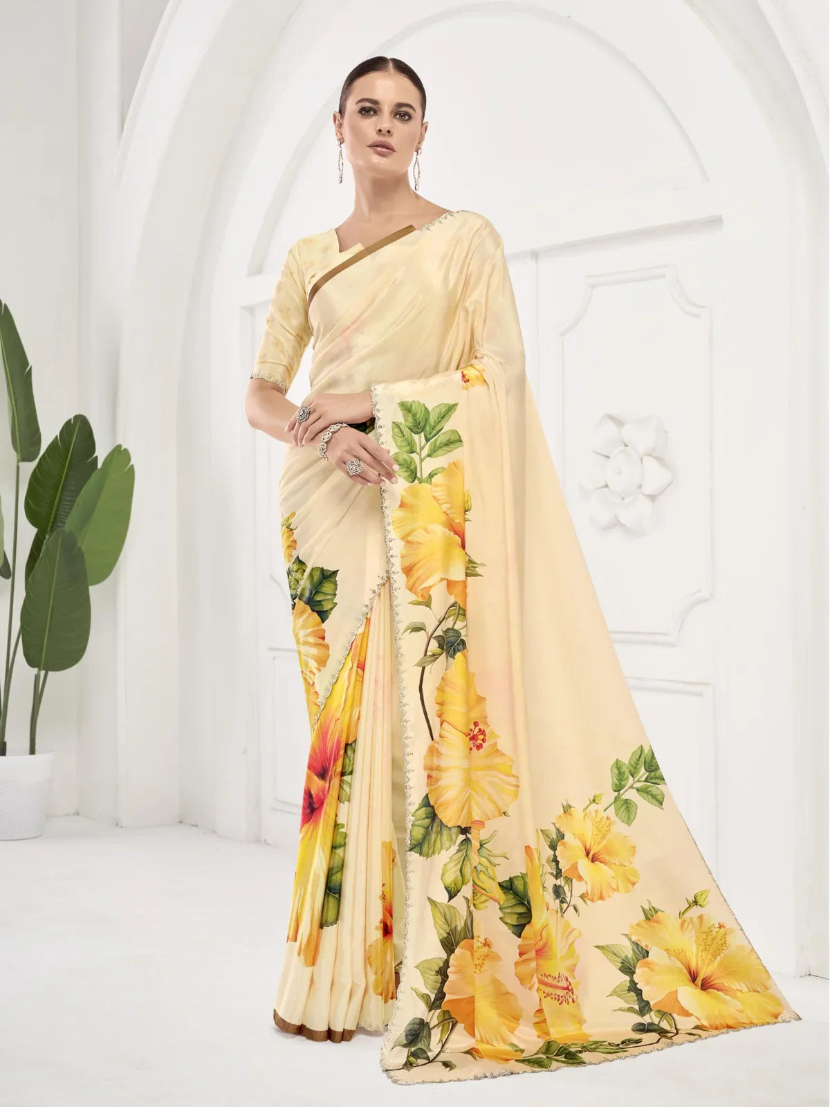 Tarani premium yellow floral silk saree with Swarovski embellished scallop border and hibiscus print