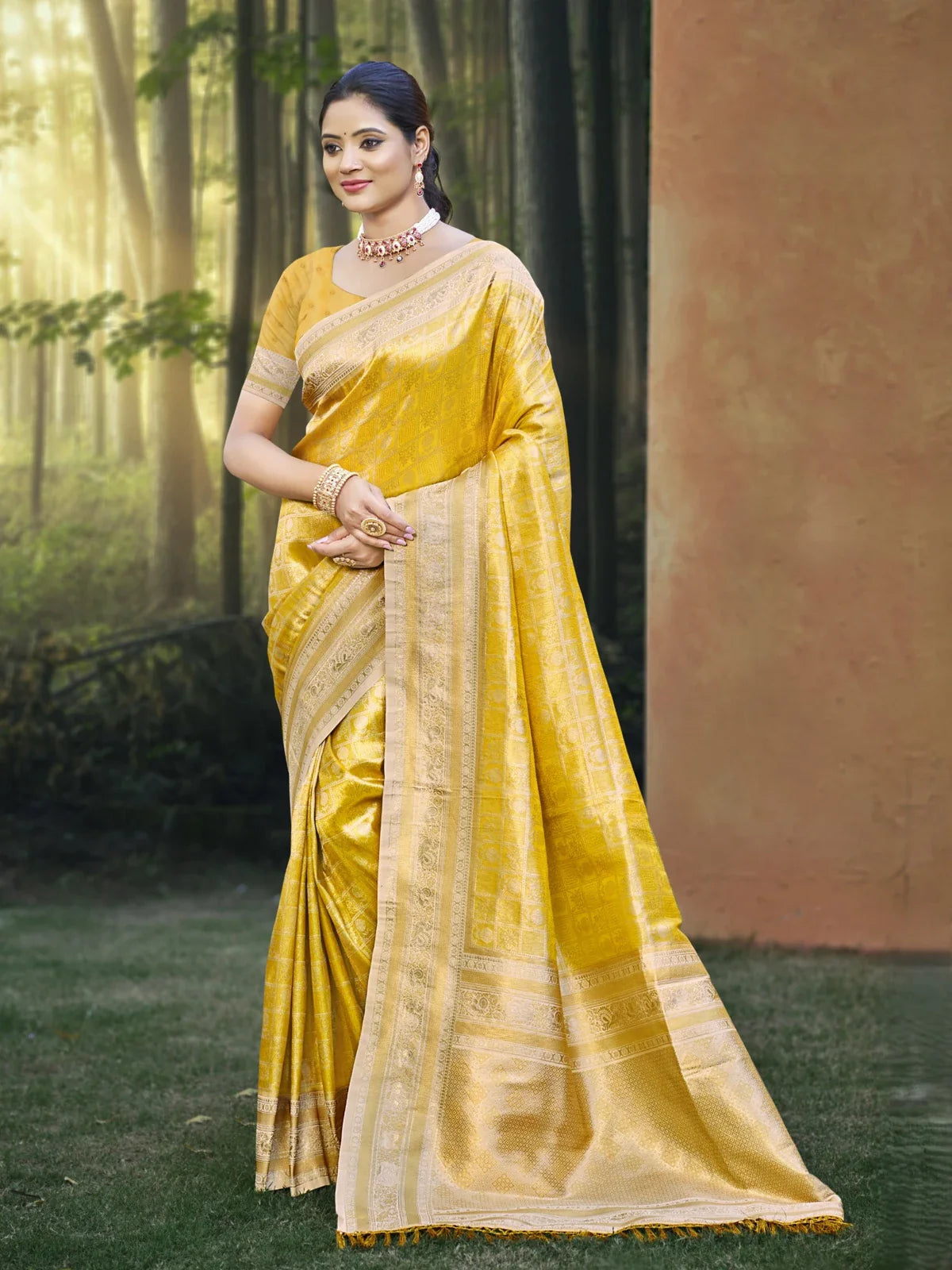 Tarani yellow kanjivaram silk saree full view with zari border and matching blouse