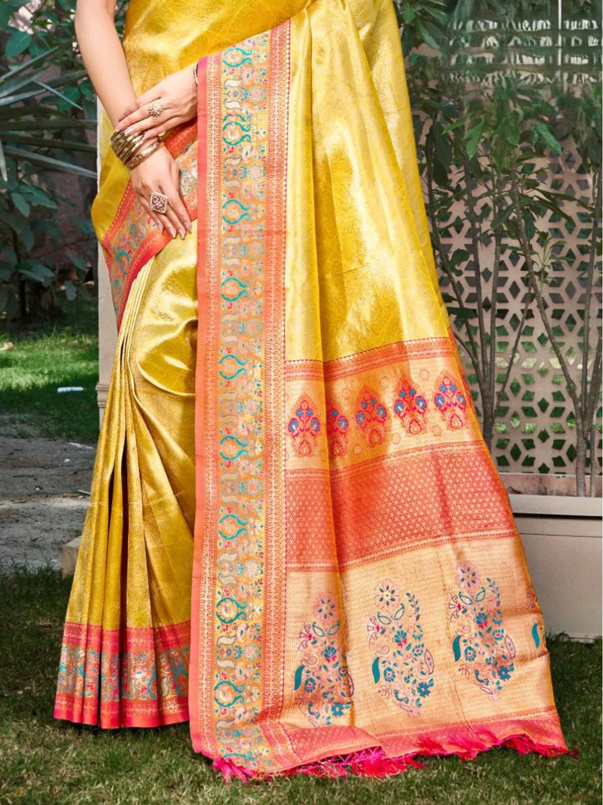 Tarani kanjivaram silk saree in yellow with detailed pallu design and woven motifs