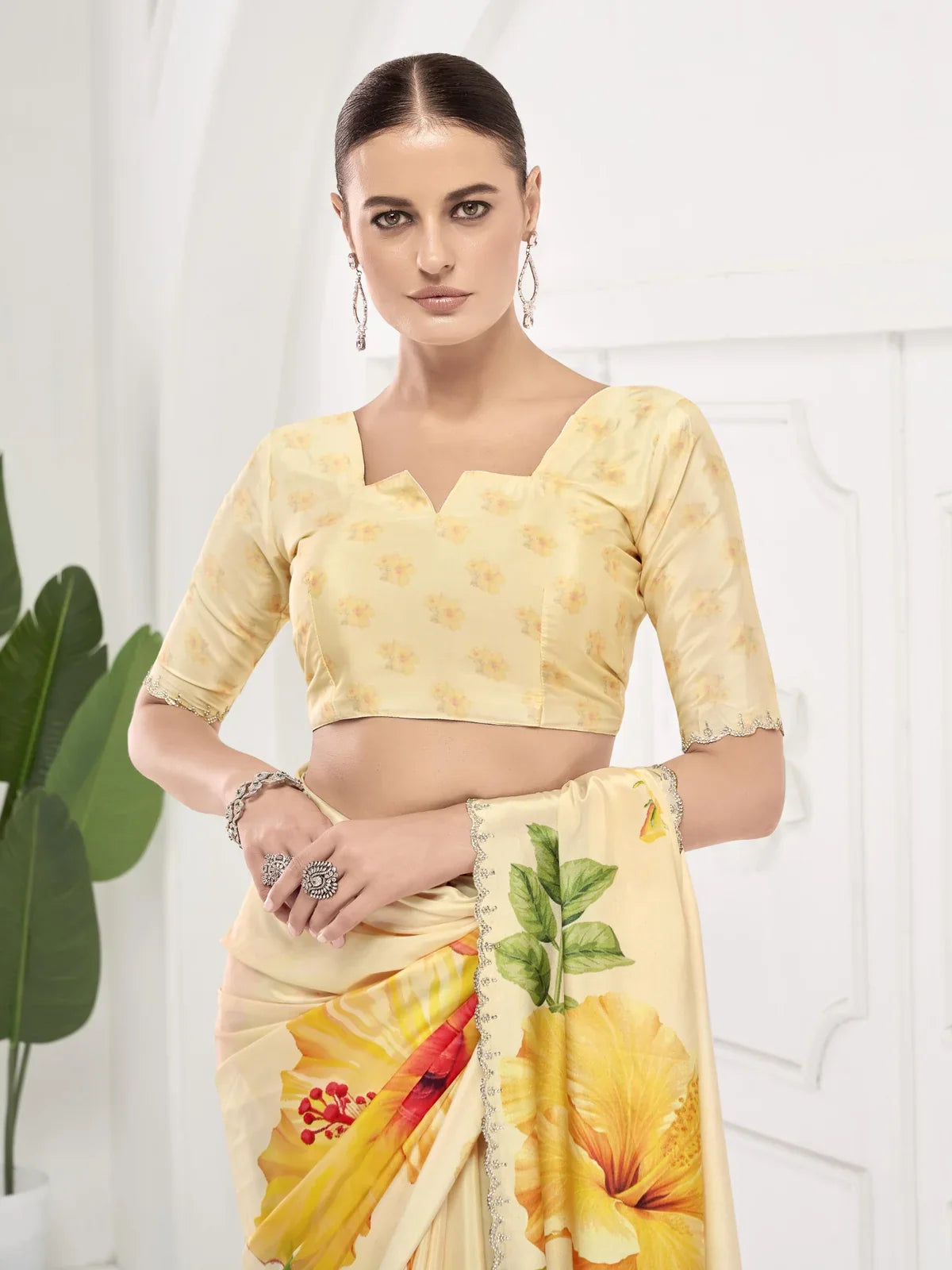 Tarani yellow silk saree with designer floral blouse for cocktail and party wear