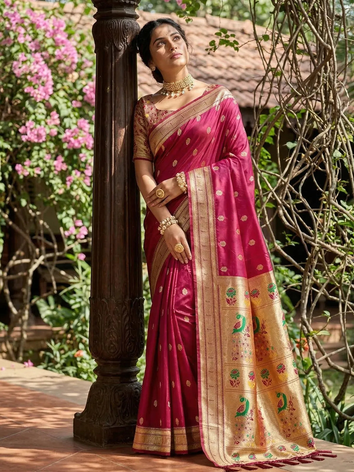 Tarani magenta soft silk saree front pose showing zari pallu and border