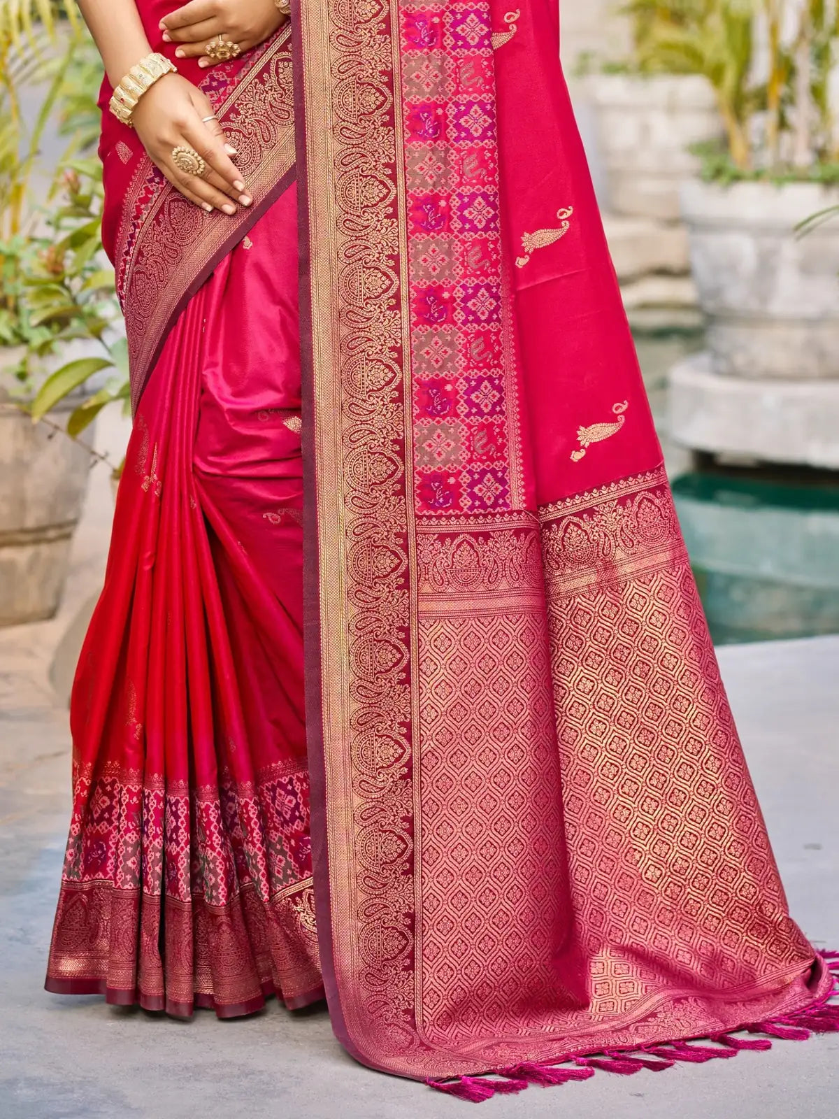 Tarani magenta soft silk saree pallu view with detailed zari weaving and elegant border design