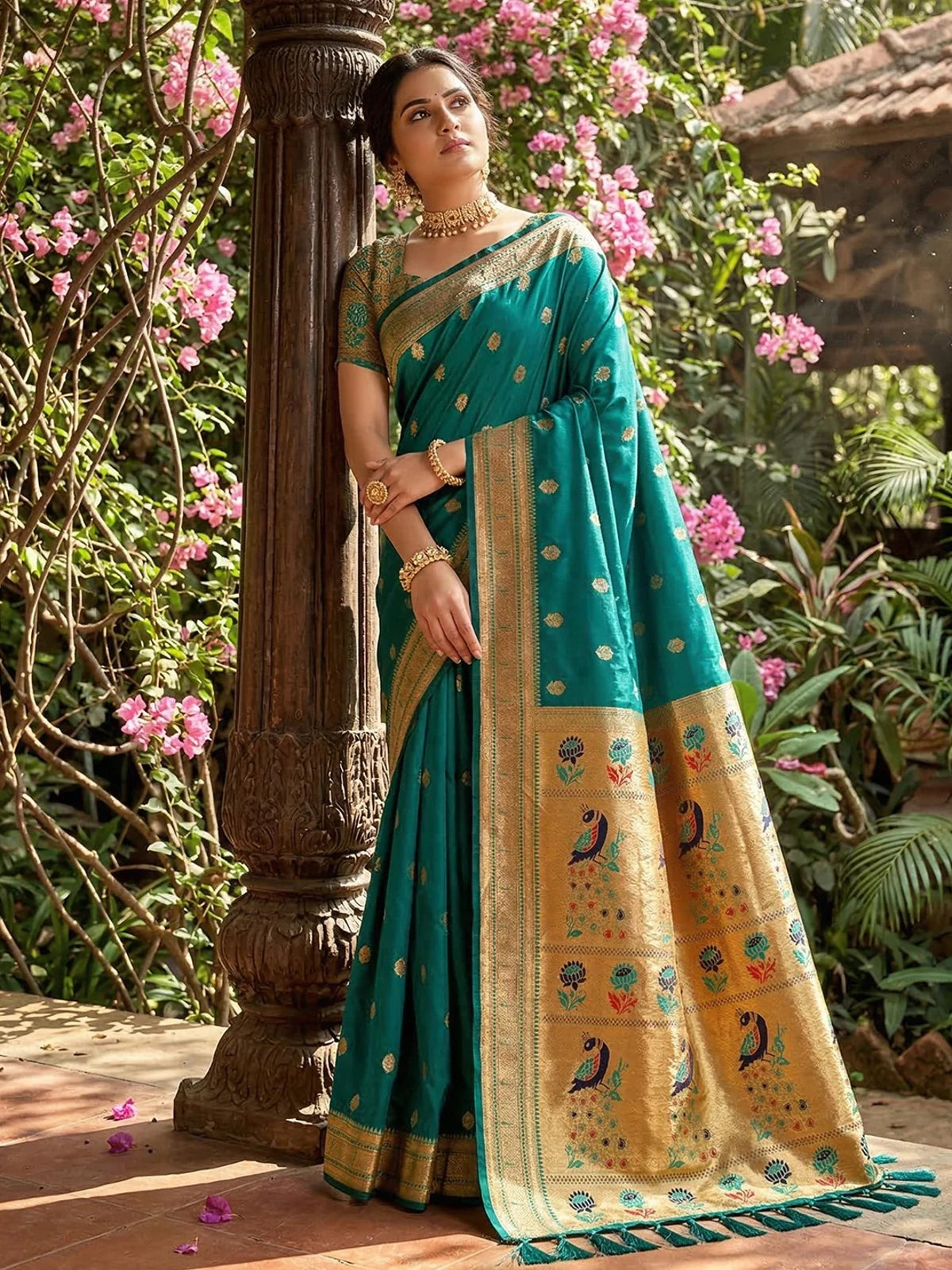 Tarani teal soft silk saree with zari motifs contrast border and decorative pallu full view Suman