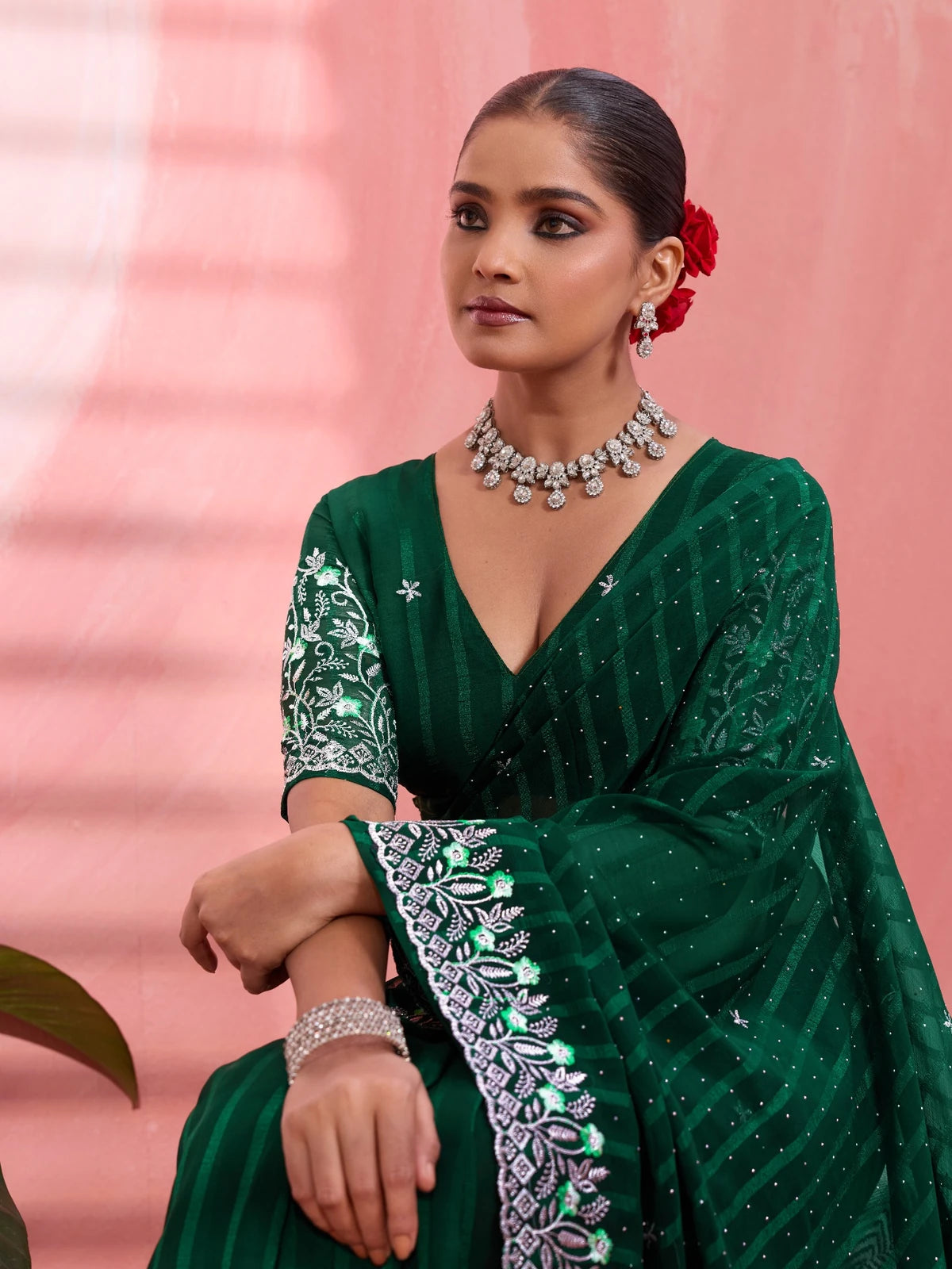 Tarani green solo chiffon saree closeup view with designer blouse and shimmer detailing