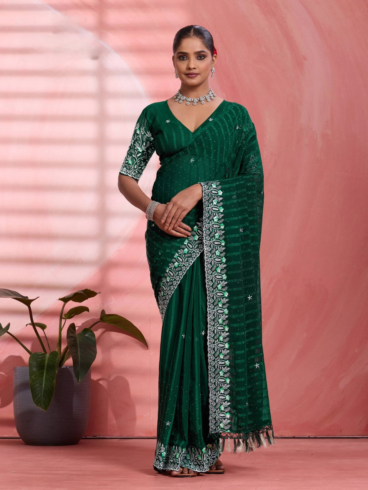 Tarani green solo chiffon saree full view with multi panel work for festive wear