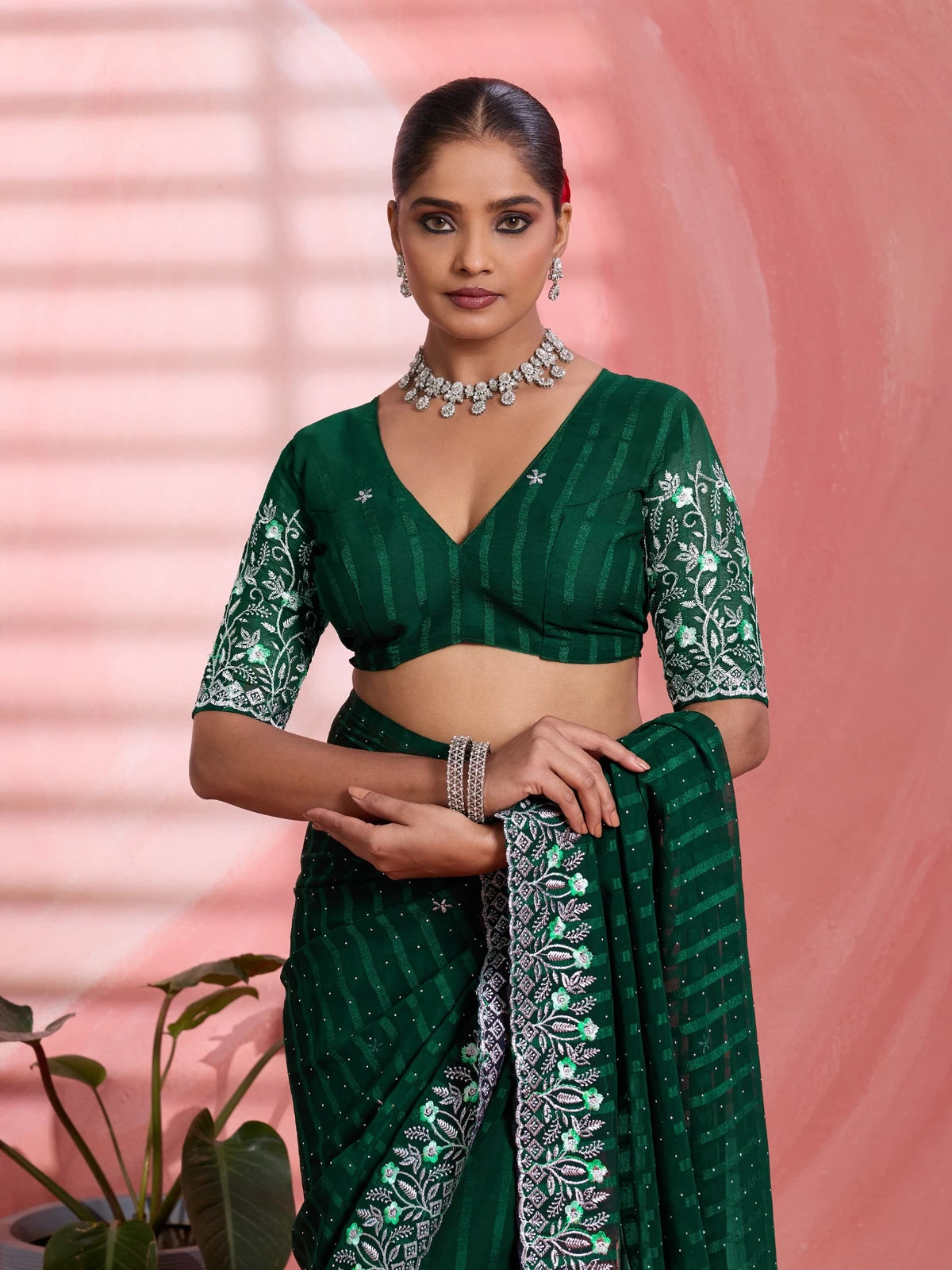 Tarani green solo chiffon saree upper body view with embroidered blouse detailing